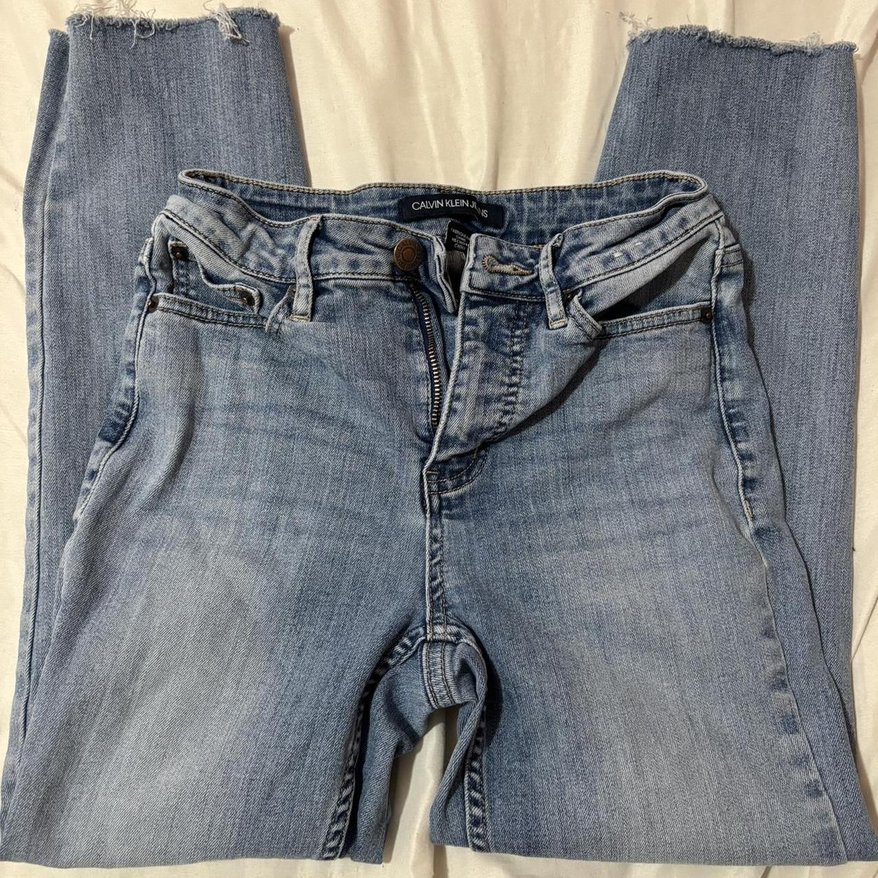calvin klein blue jeans, size 24 length is on the... - Depop