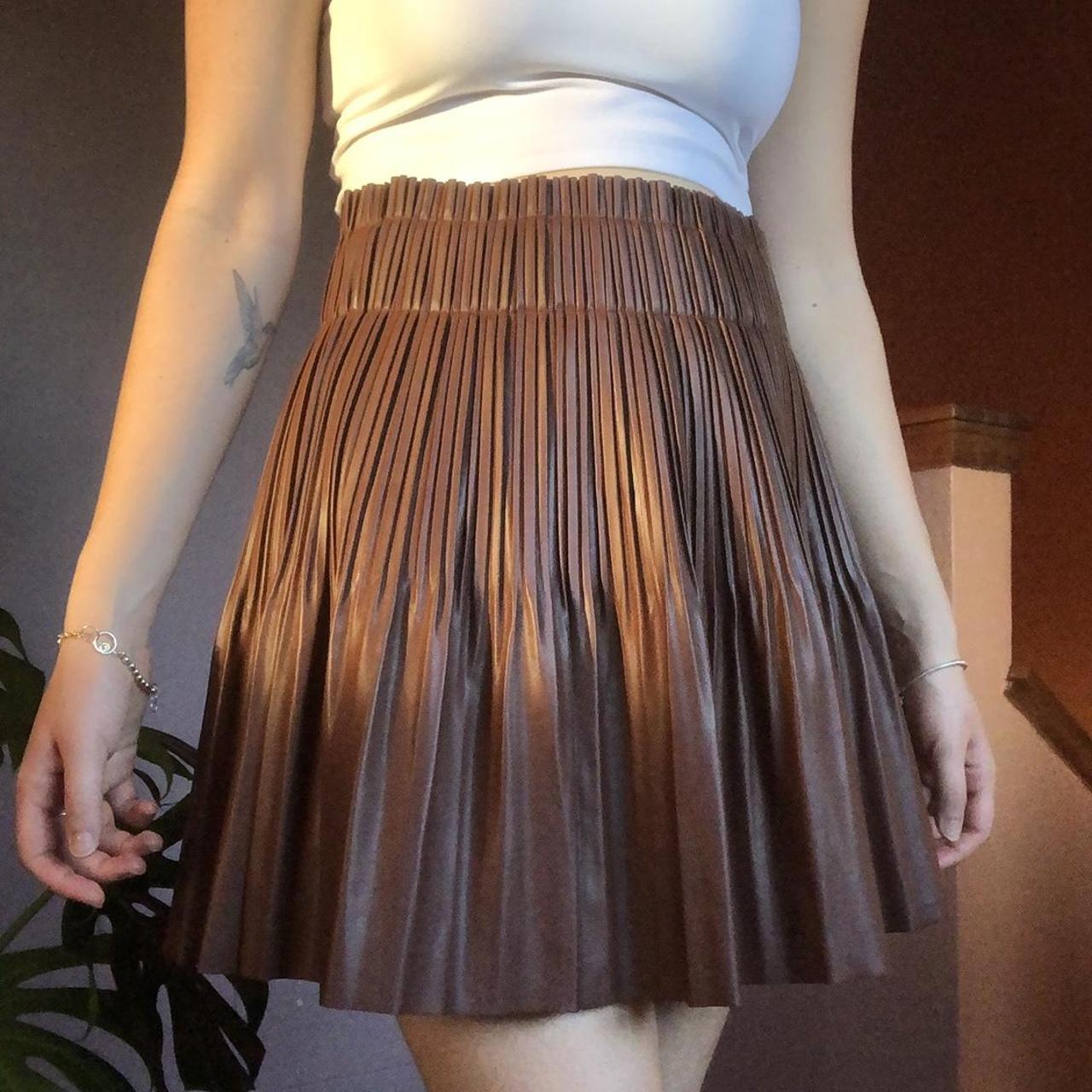 Faux leather pleated skirt. Would look so cute with... - Depop