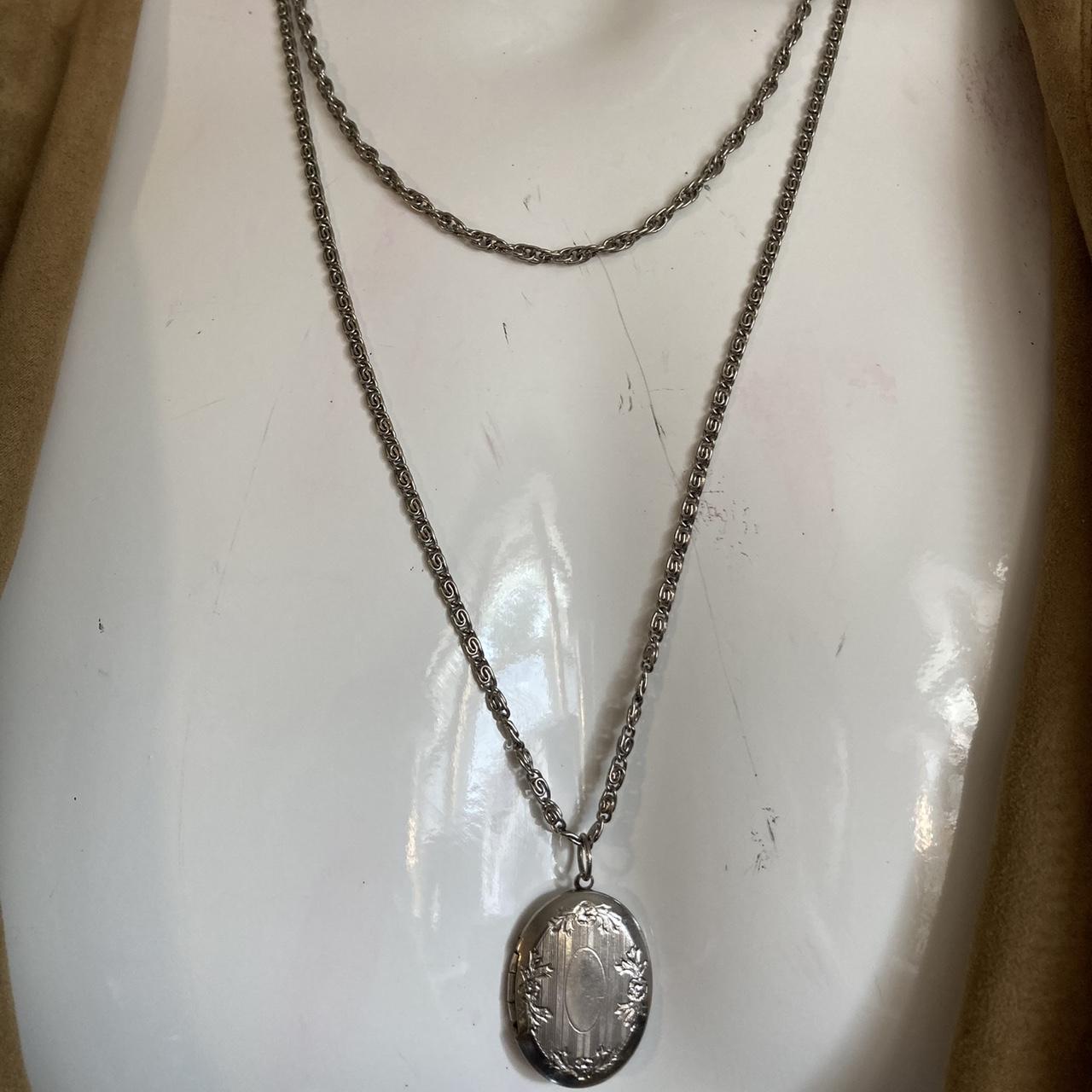 Vintage silver tone double stranded oval locket with... - Depop