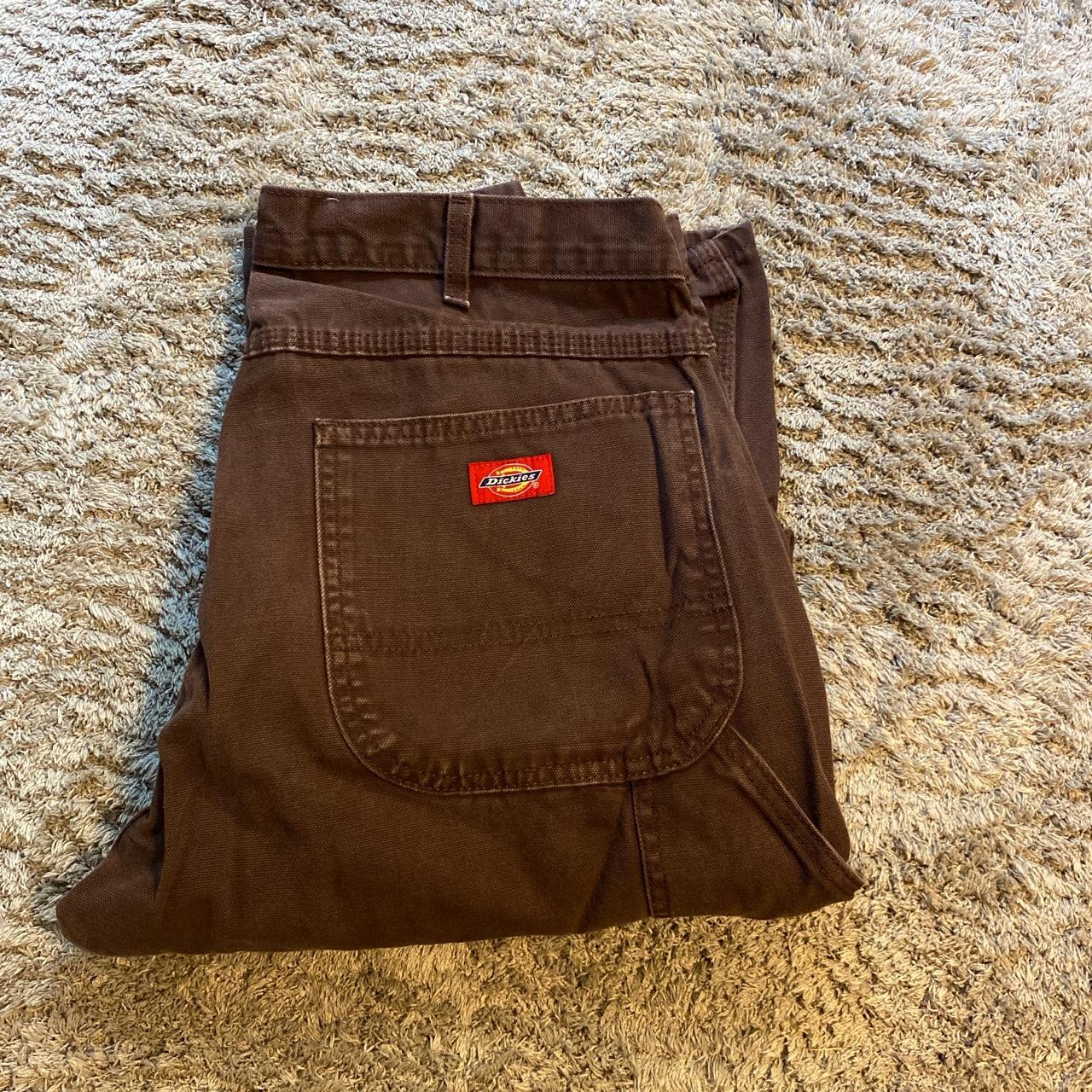 Dark brown dickies work pants. Loose fit. 34x32... - Depop