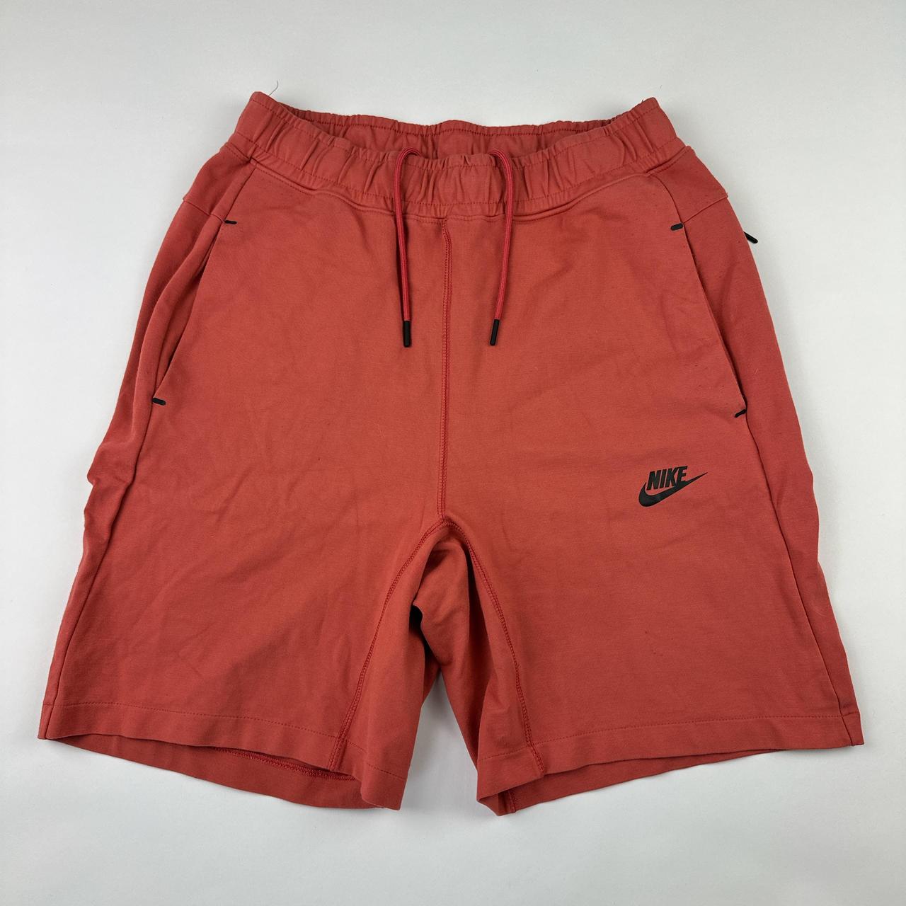 Orange nike tech shorts sale