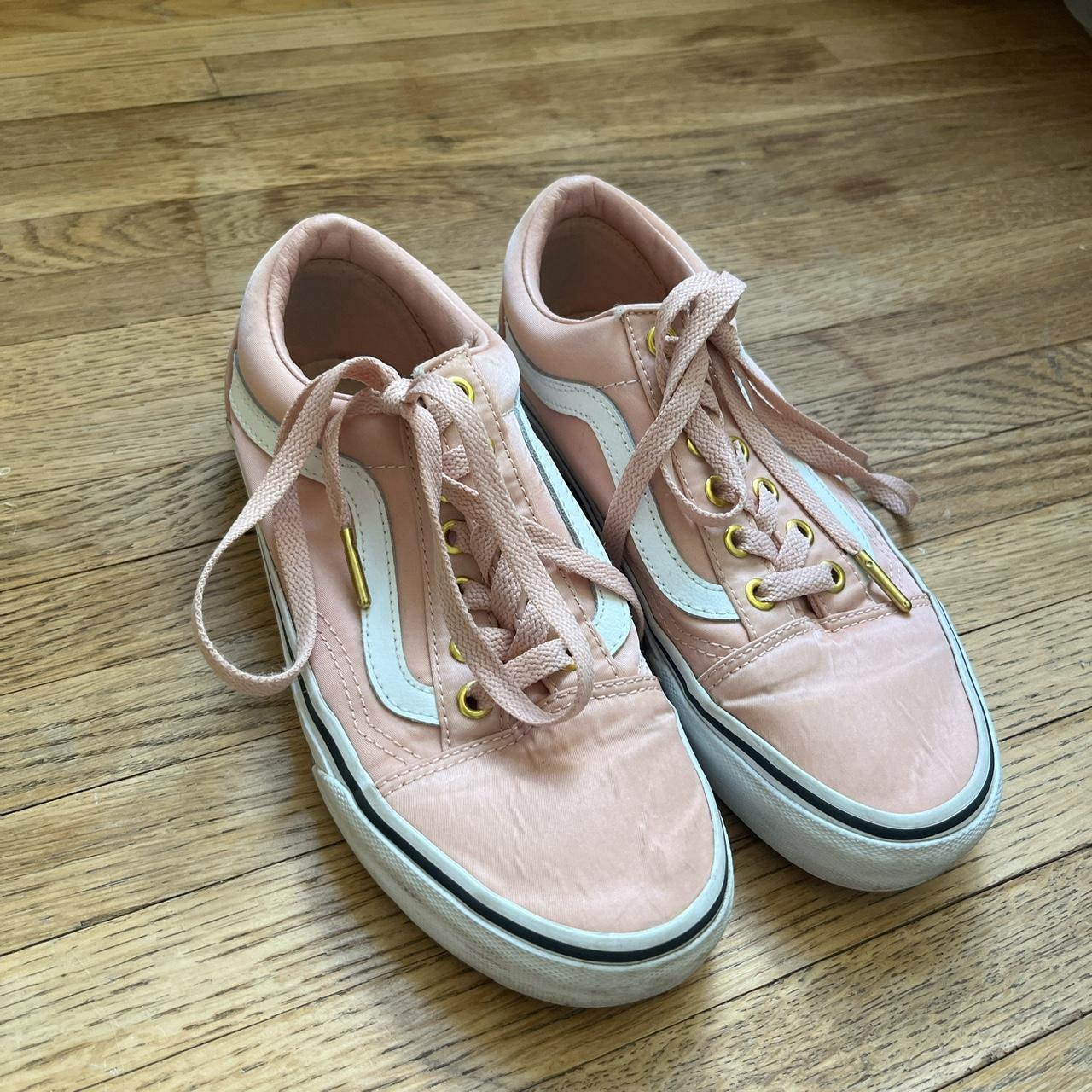 Pink and white Vans with gold details. Worn maybe. Depop