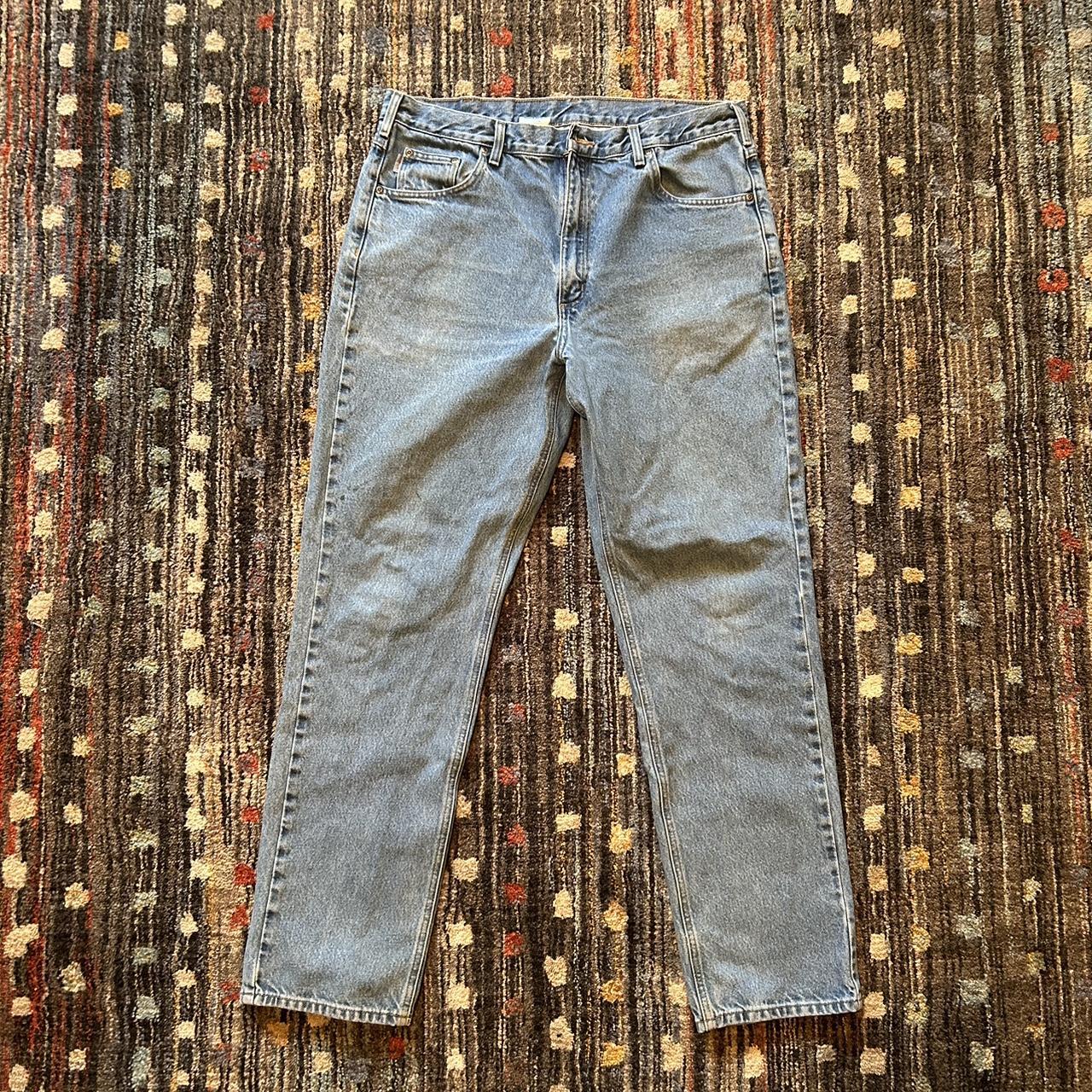 Carhartt Blue Jeans Staining is shown on the front... - Depop