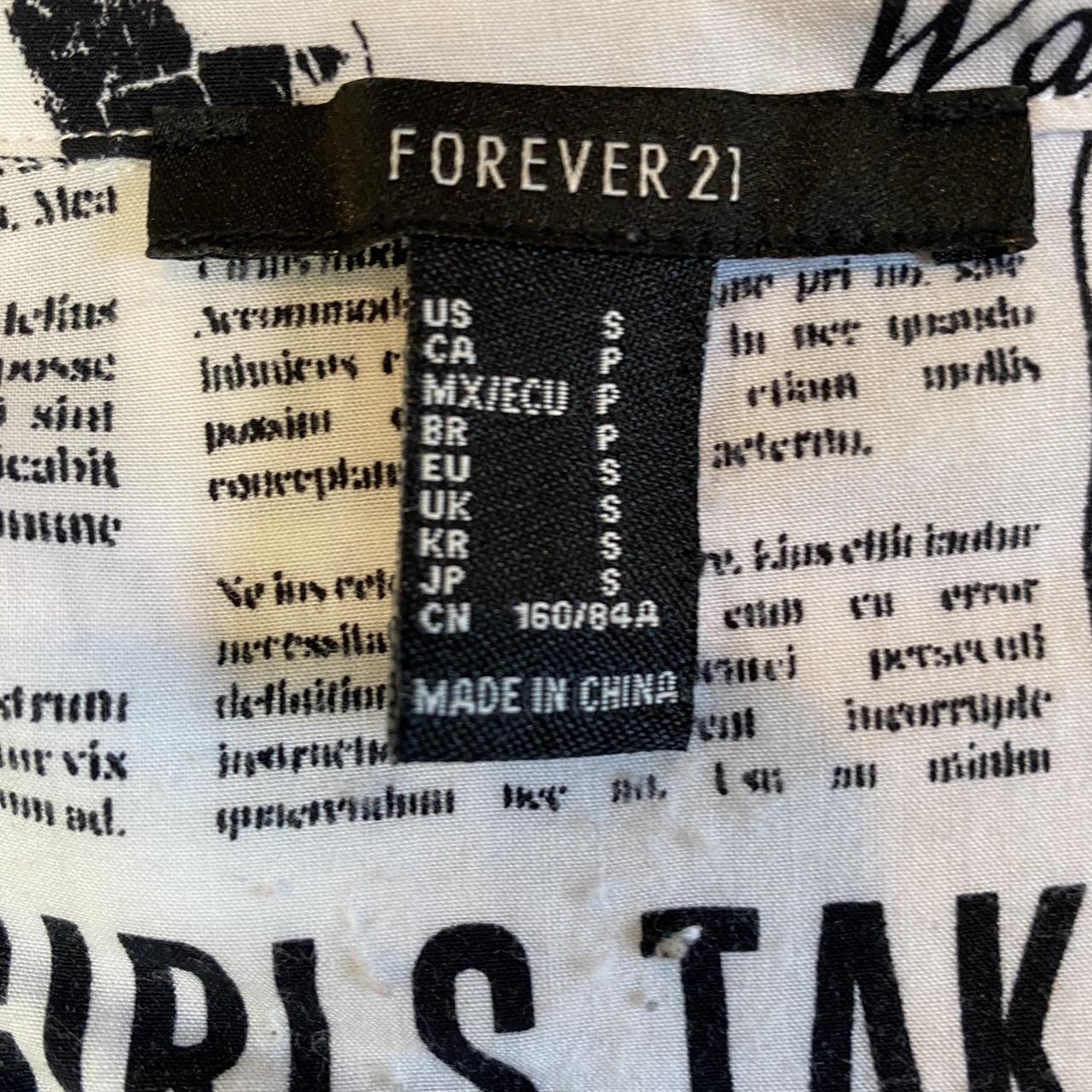 Forever 21 journalistic newspaper themed small short... - Depop