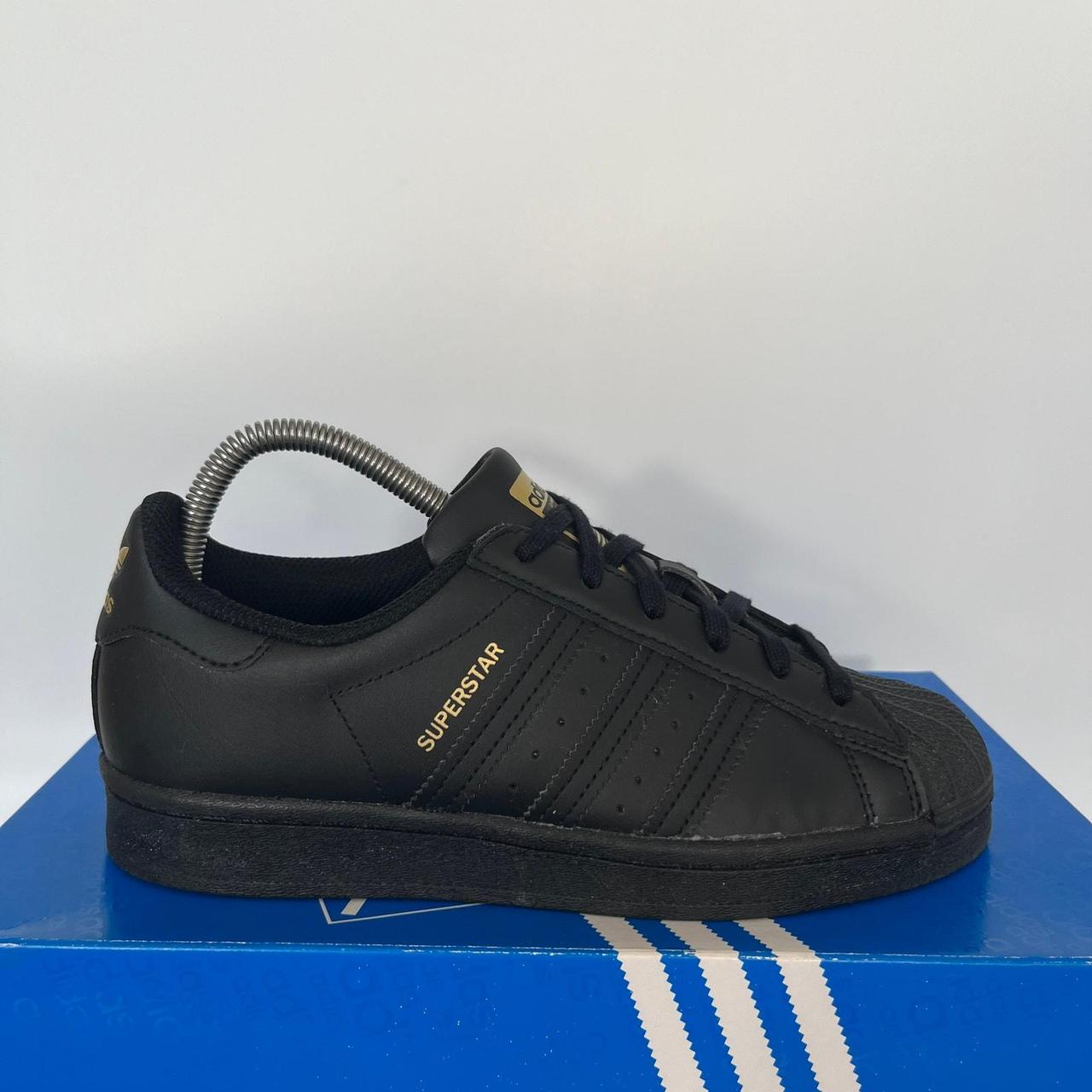 Black and gold adidas superstar womens best sale