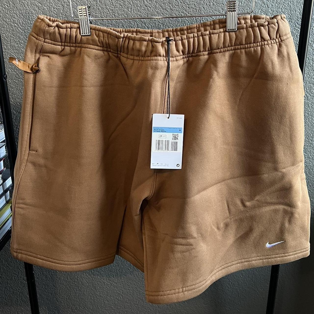 tan nike shorts