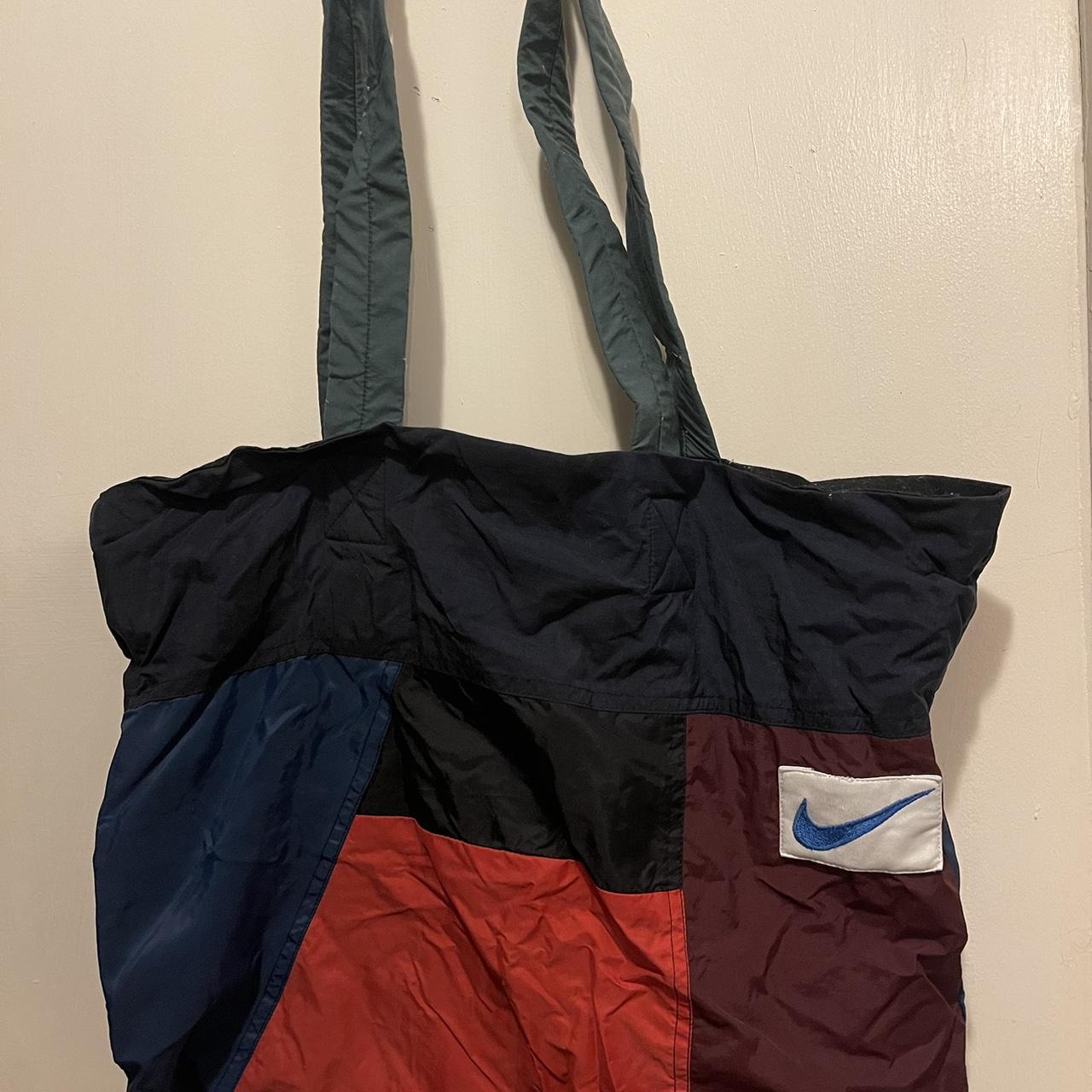 Nike oversized discount swoosh tote bag