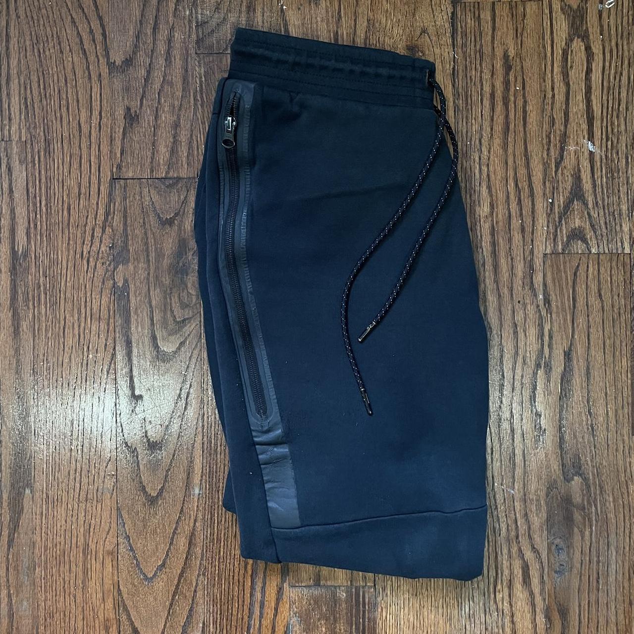Black Nike tech fleece pants/joggers Size medium - Depop