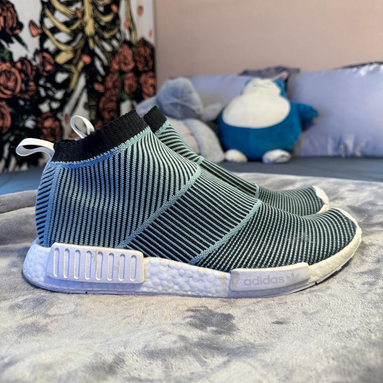 This is an almost perfect pair of Adidas NMD CS1. Depop