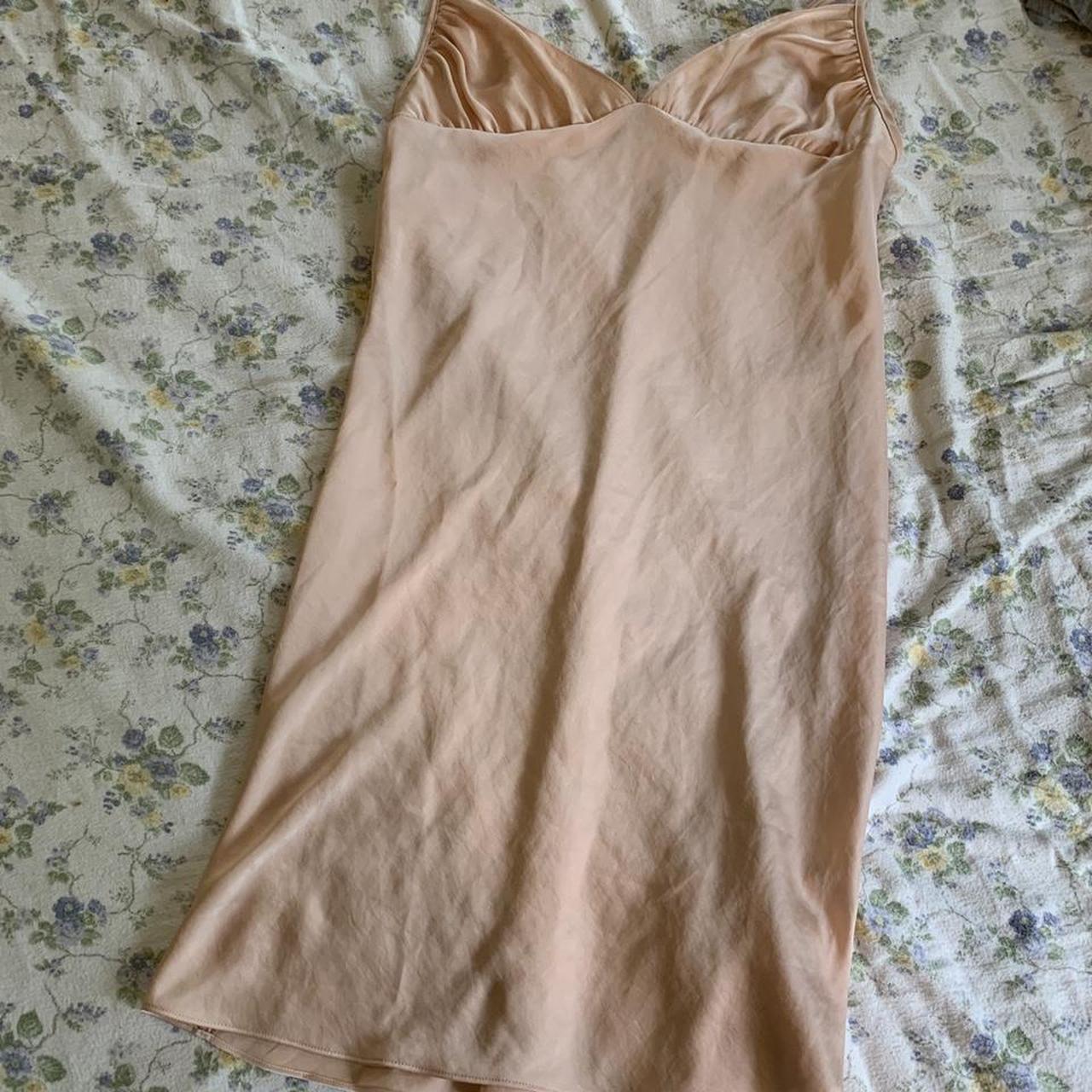 Blush pink slip dress from Wilfred from... Depop