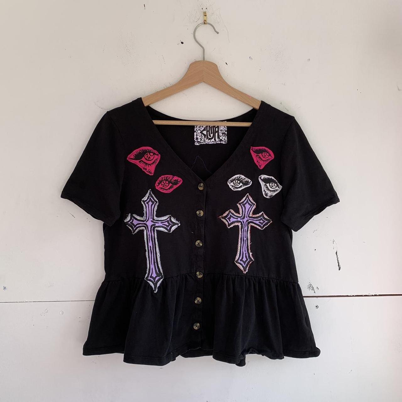 1 of 1 🩵 Reworked black cross top w buttons Screen... Depop