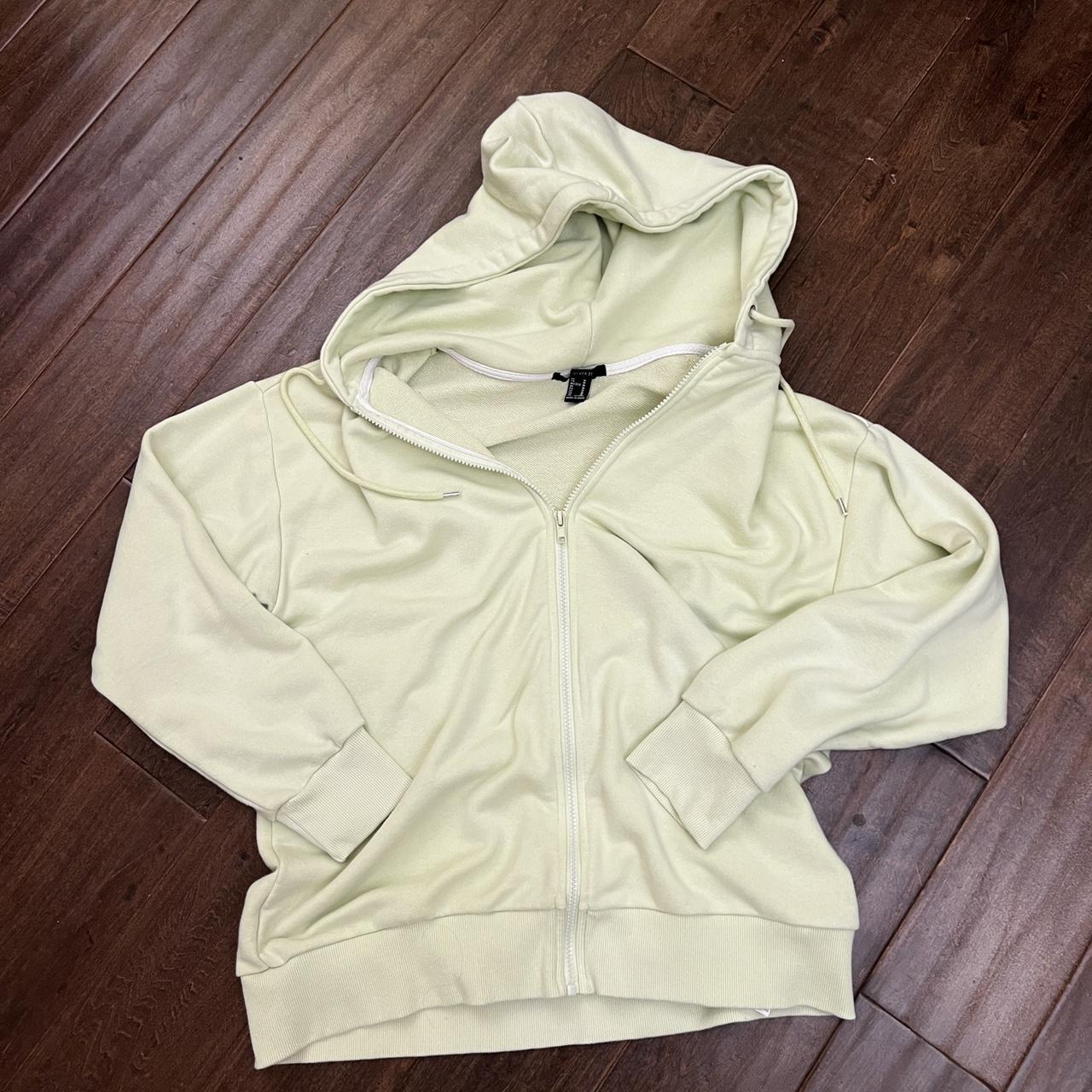 Zip up light green jacket - the color is hard to... - Depop