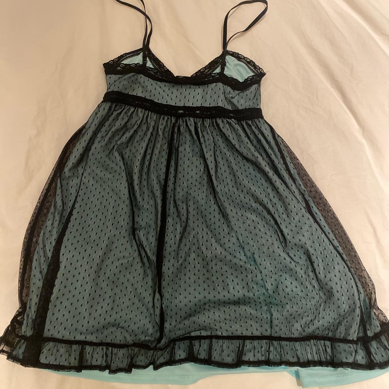 Light blue babydoll mini dress with black dotted... - Depop