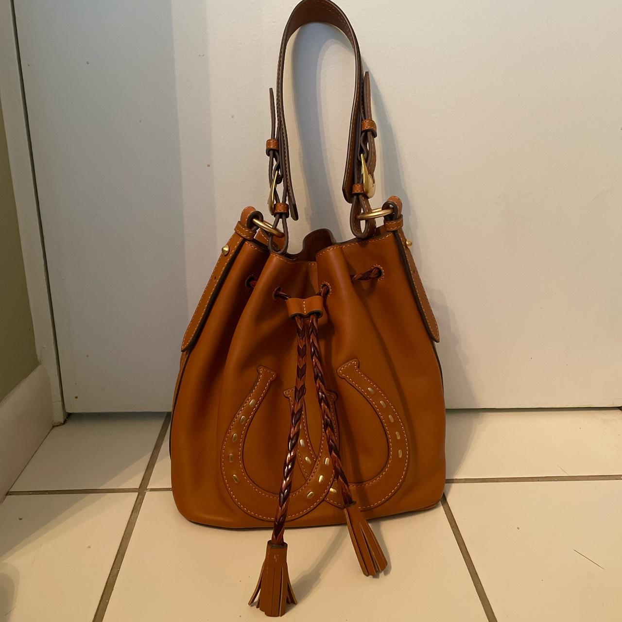 DOONEY & BOURKE leather double horseshoe drawstring... Depop