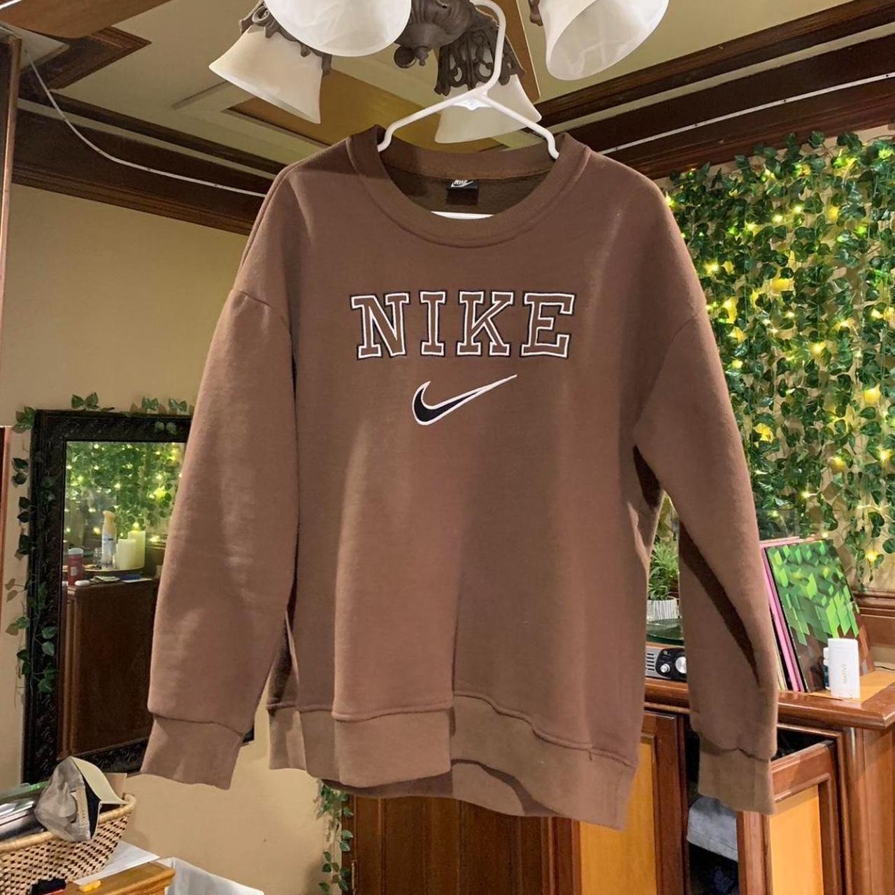 Re selling : Vintage looking brown Nike... - Depop