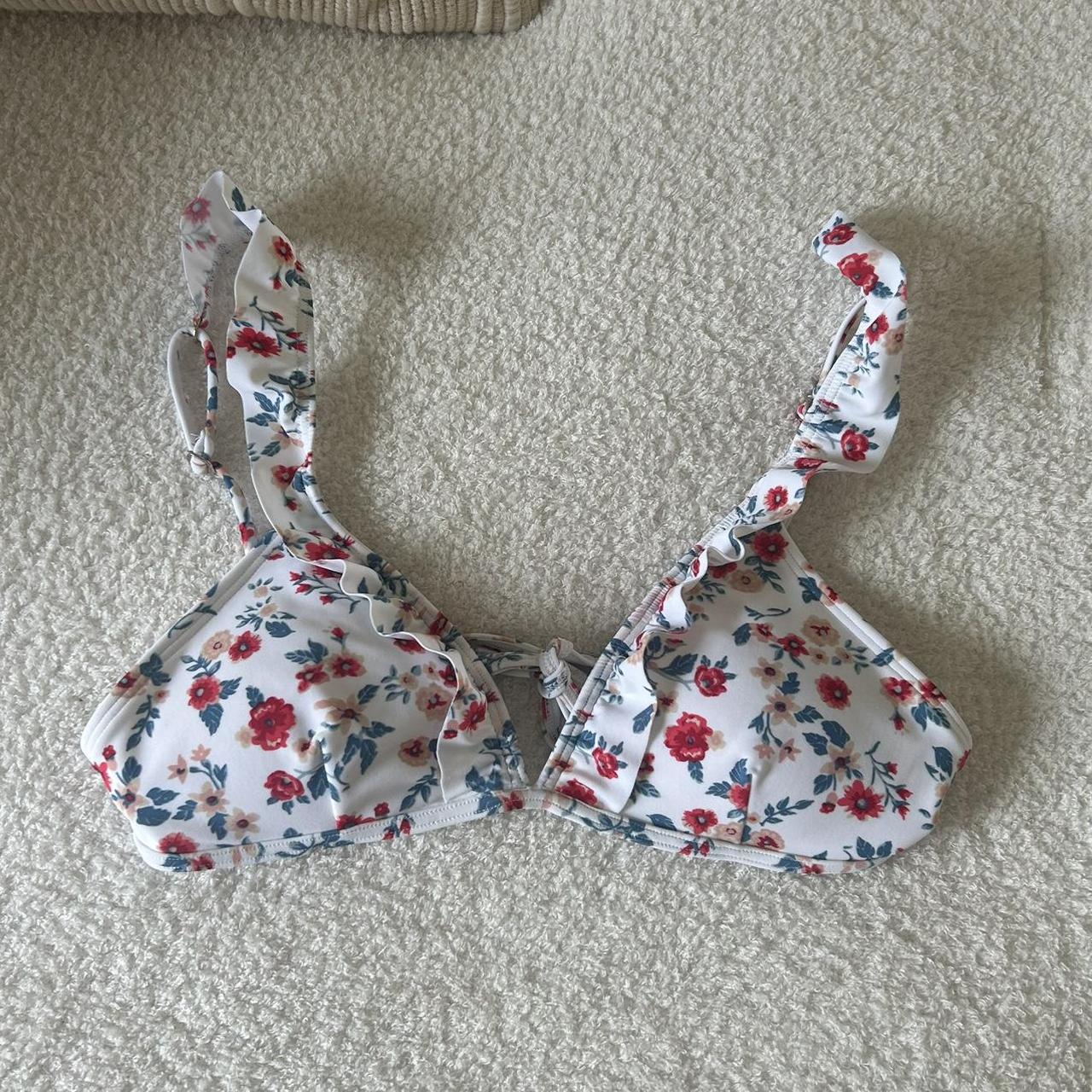Hollister bikini. Light pink bottoms and floral top.... Depop
