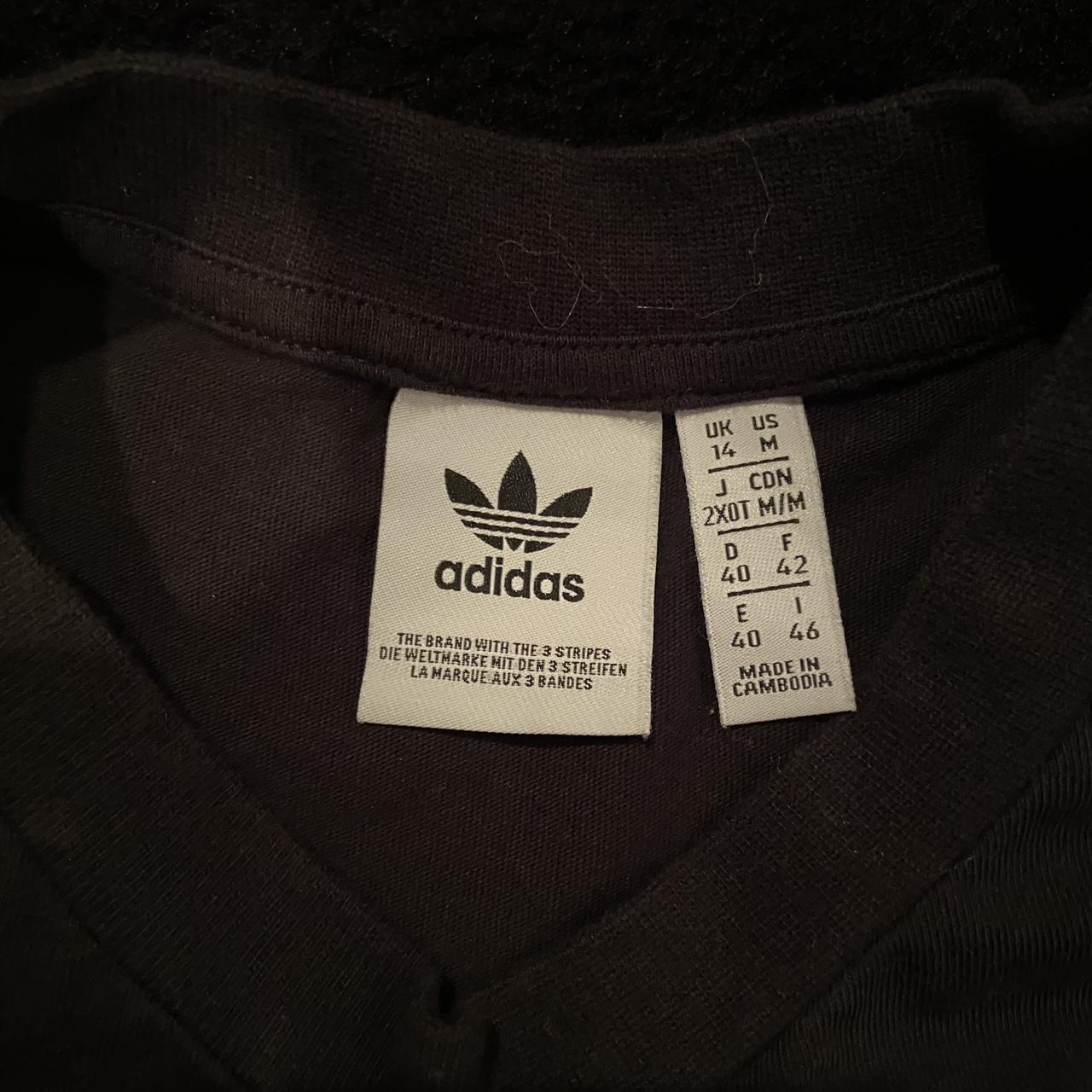 Black and white adidas crop top. Has scrunched... Depop