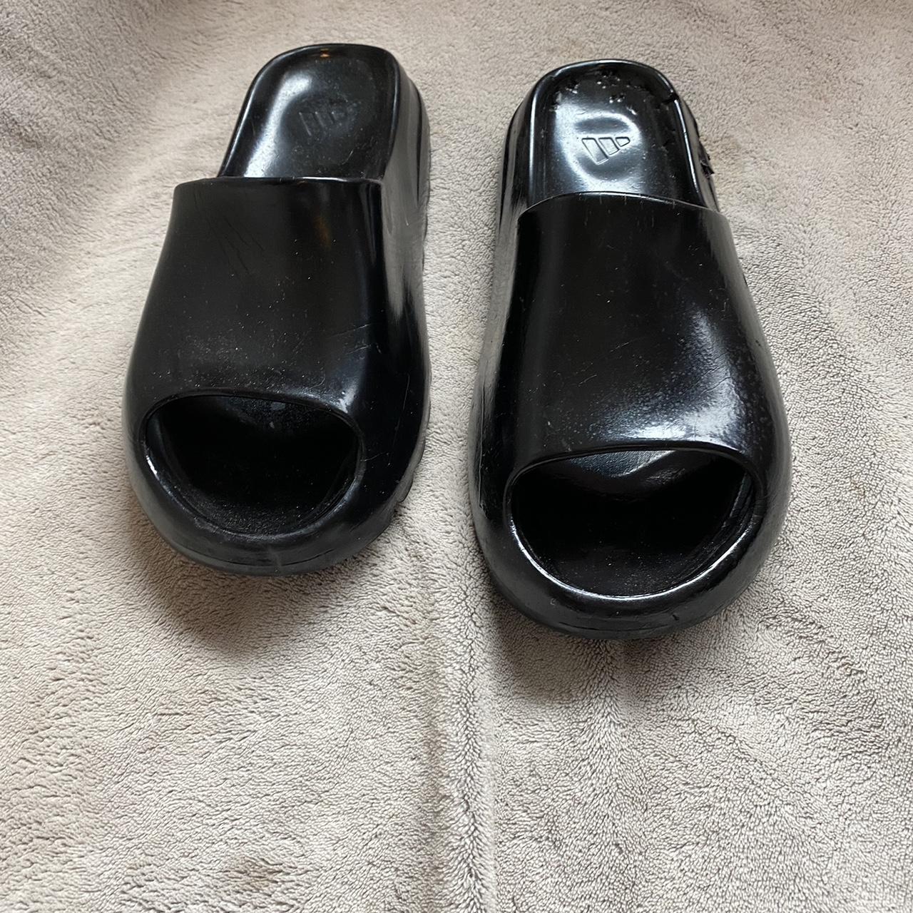Yeezy slides Originally brown but painted black Dog... Depop