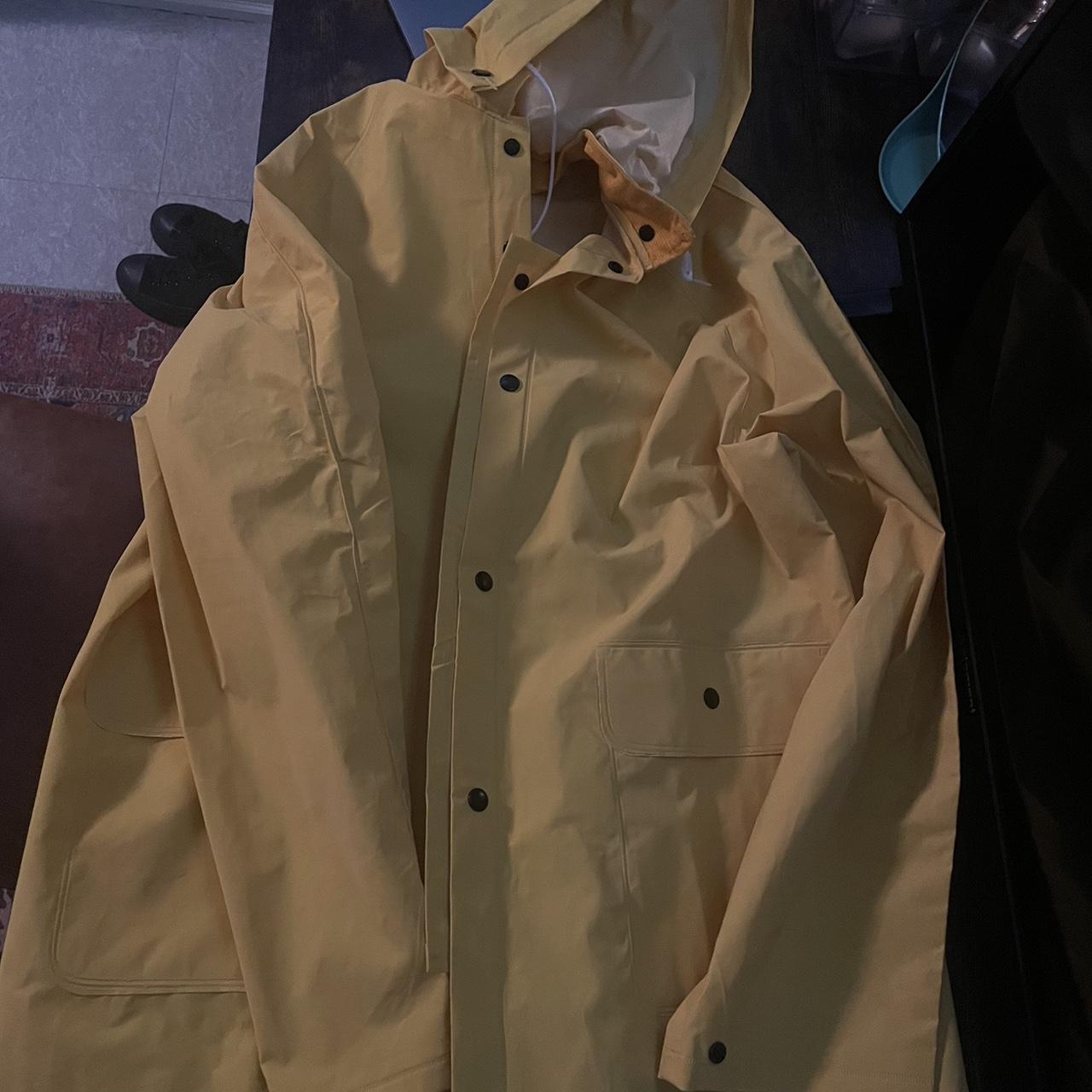 yellow hooded rain jacket - Depop