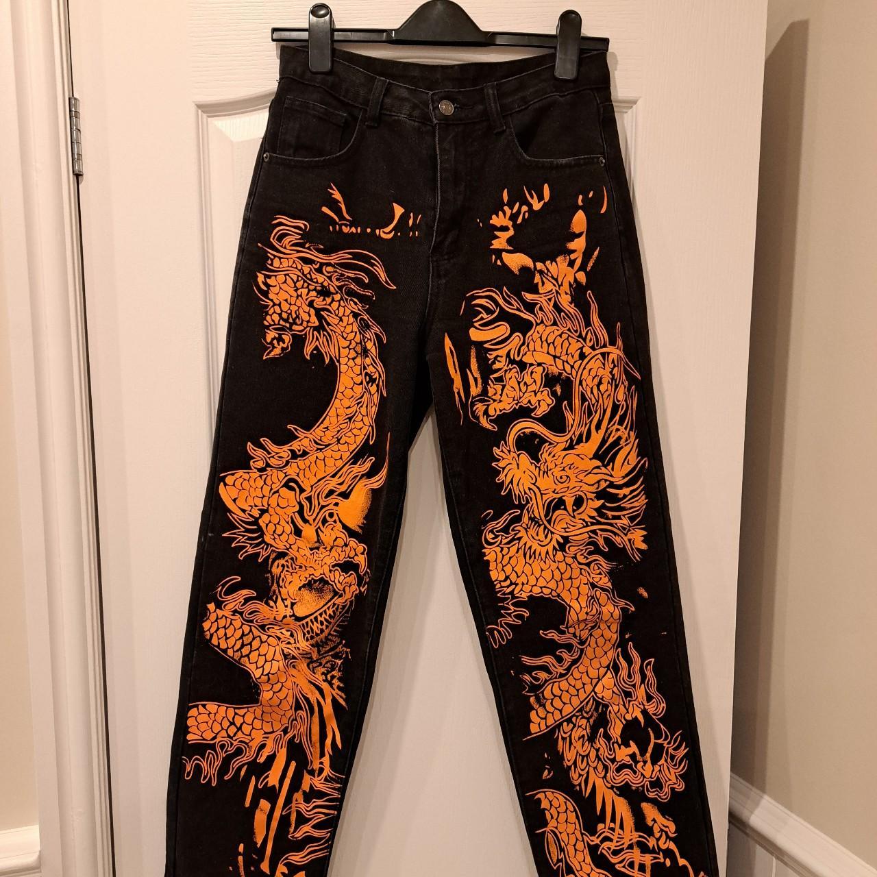 •Orange and black dragon print jeans •Shein •Size... | Depop