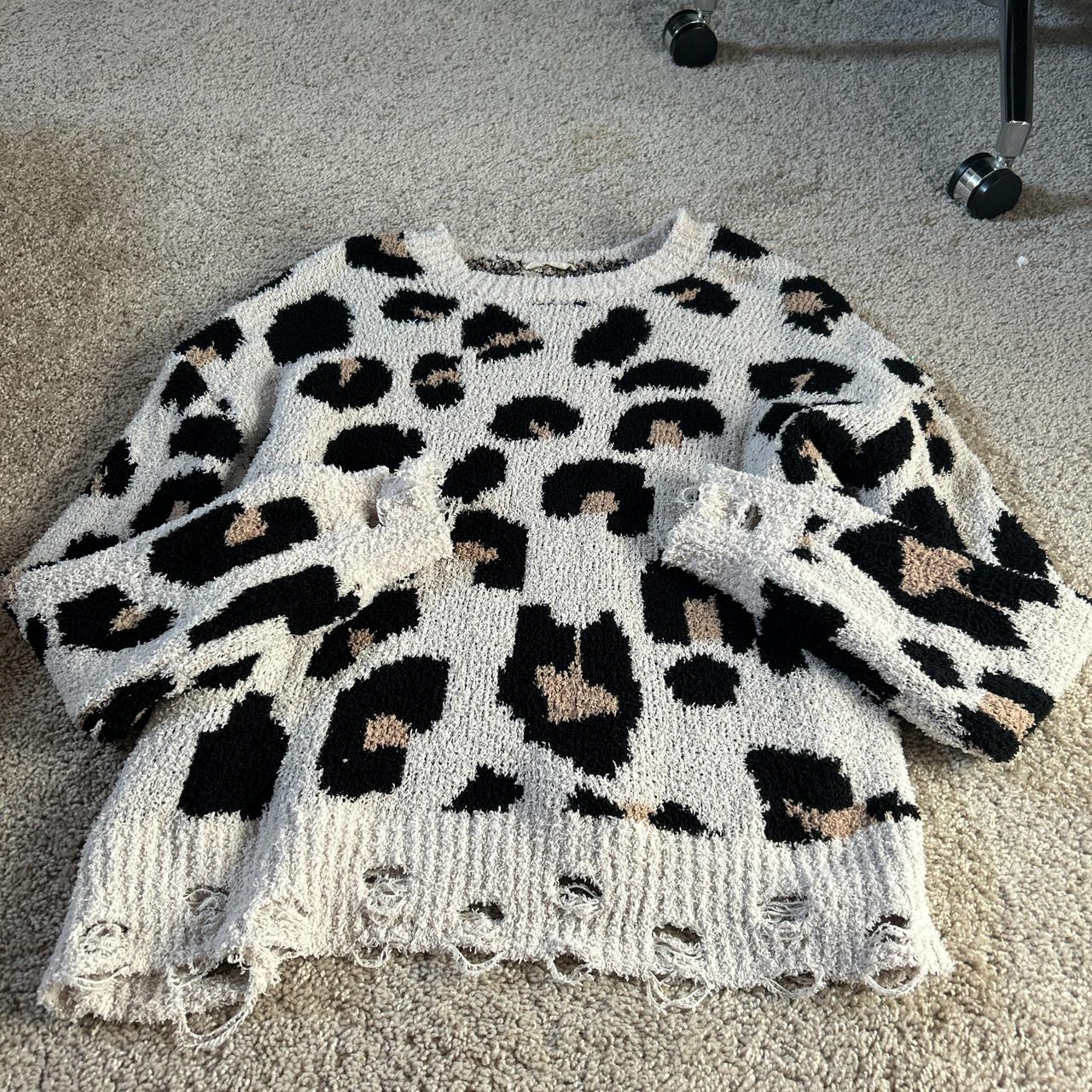 Cheetah print knit sweater with distressed sleeves. Depop