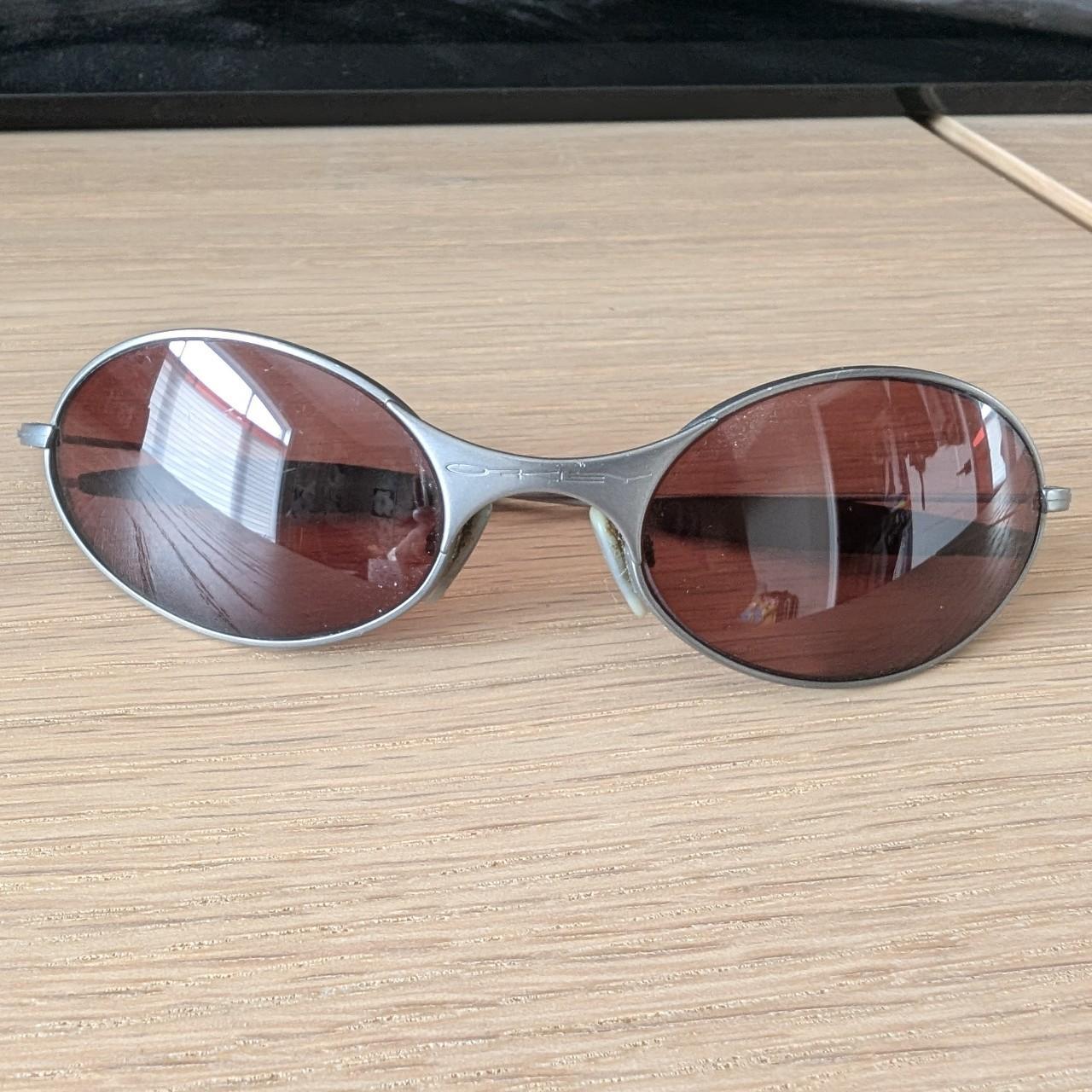Rare 90s Unisex Oakley E-Wire Titanium Sunglasses in | Depop Rare 90s Unisex Oakley E-Wire Titanium Sunglasses in | Depop