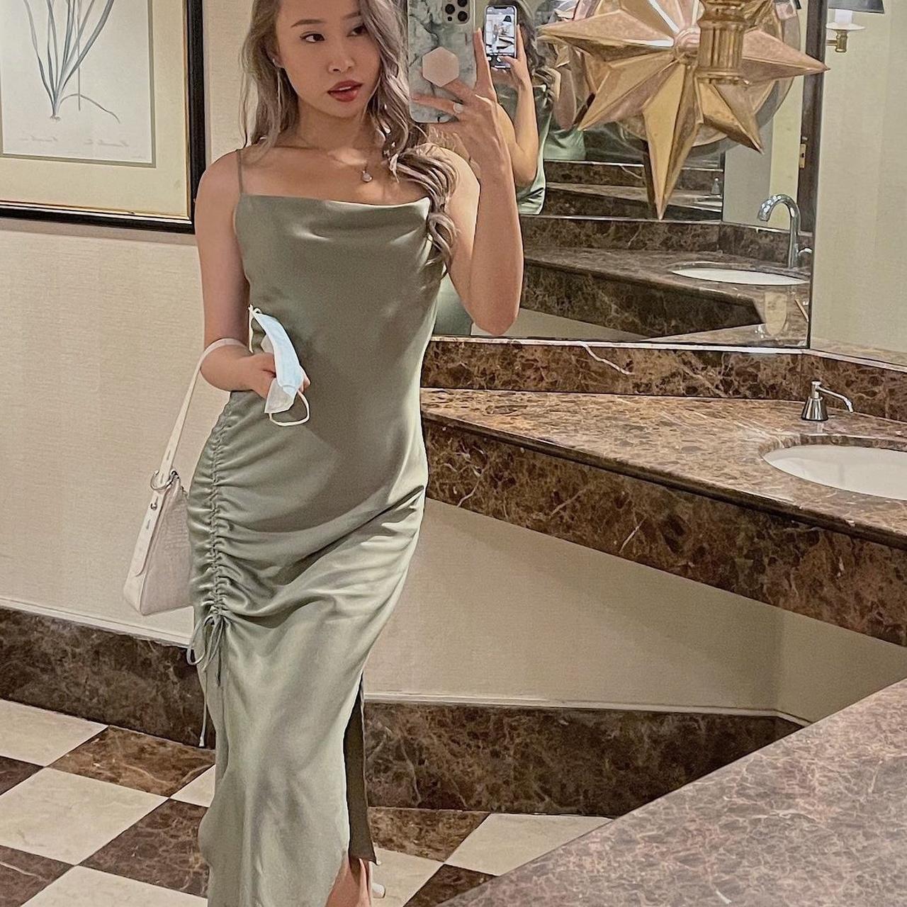 Sage green satin slip dress. It s an XS but it def