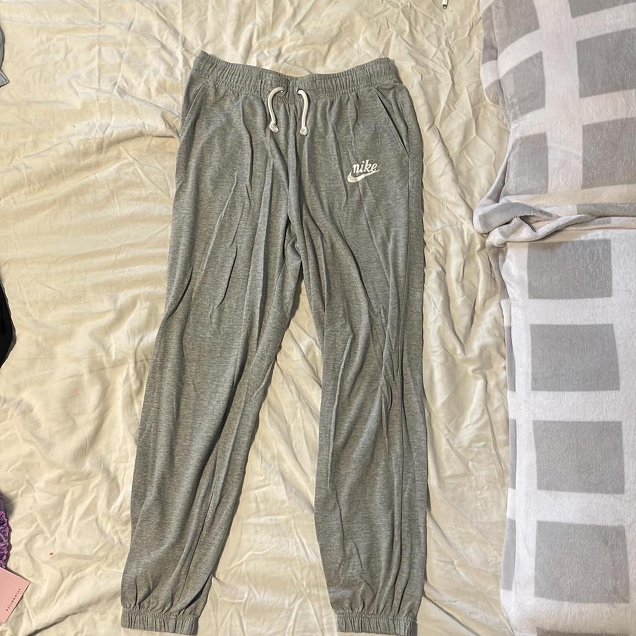 Nike light grey jogger sweatpants size small;... Depop