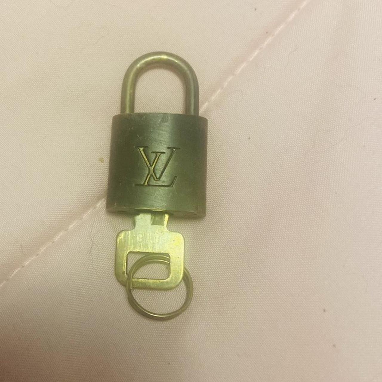 LV locket with key #318 Can be used on bags or - Depop
