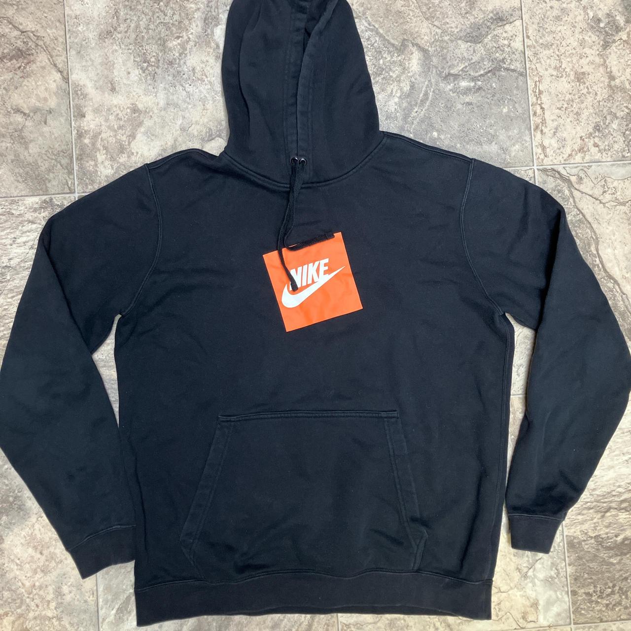 orange white and black nike hoodie