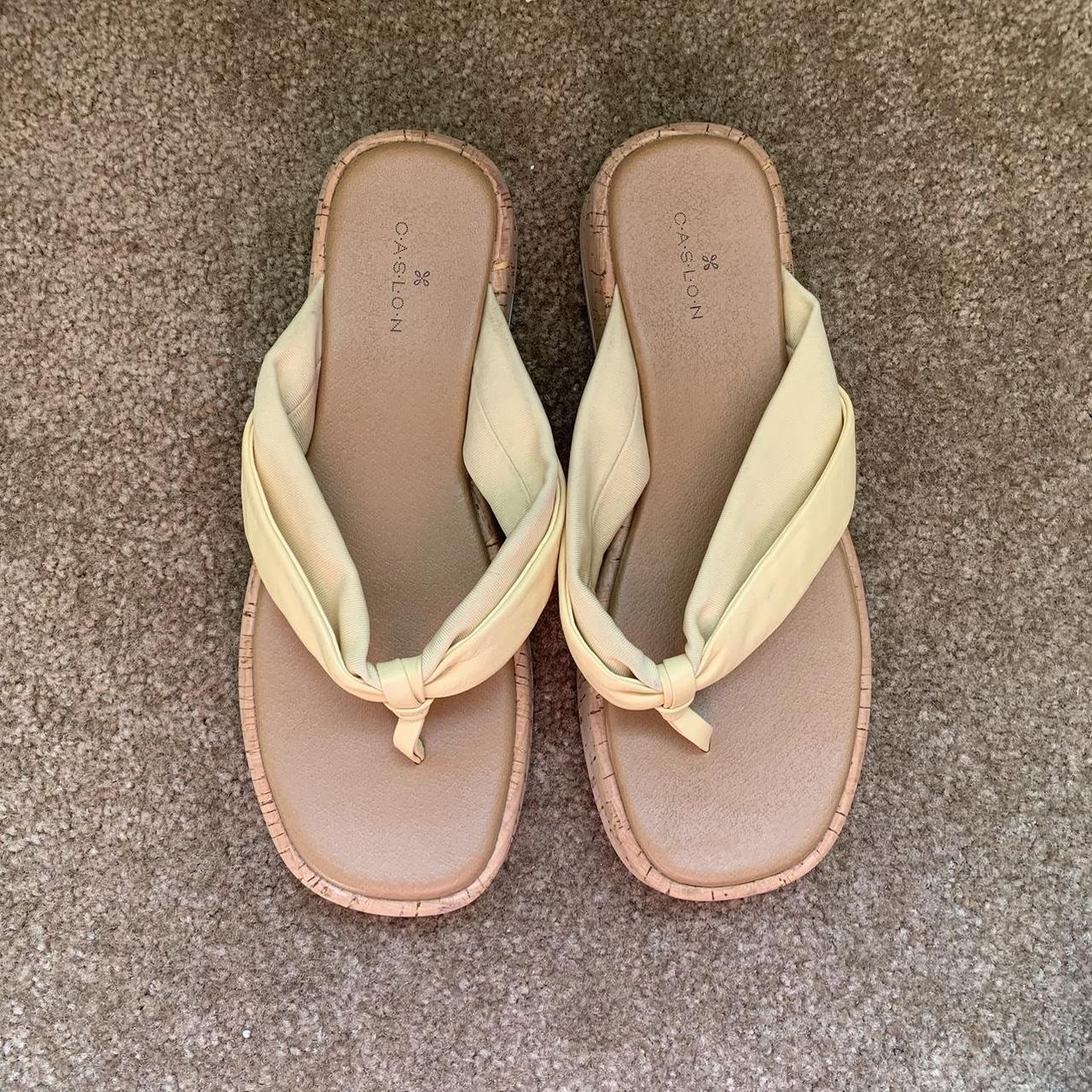Platform pale yellow flip flops. Worn a handful of