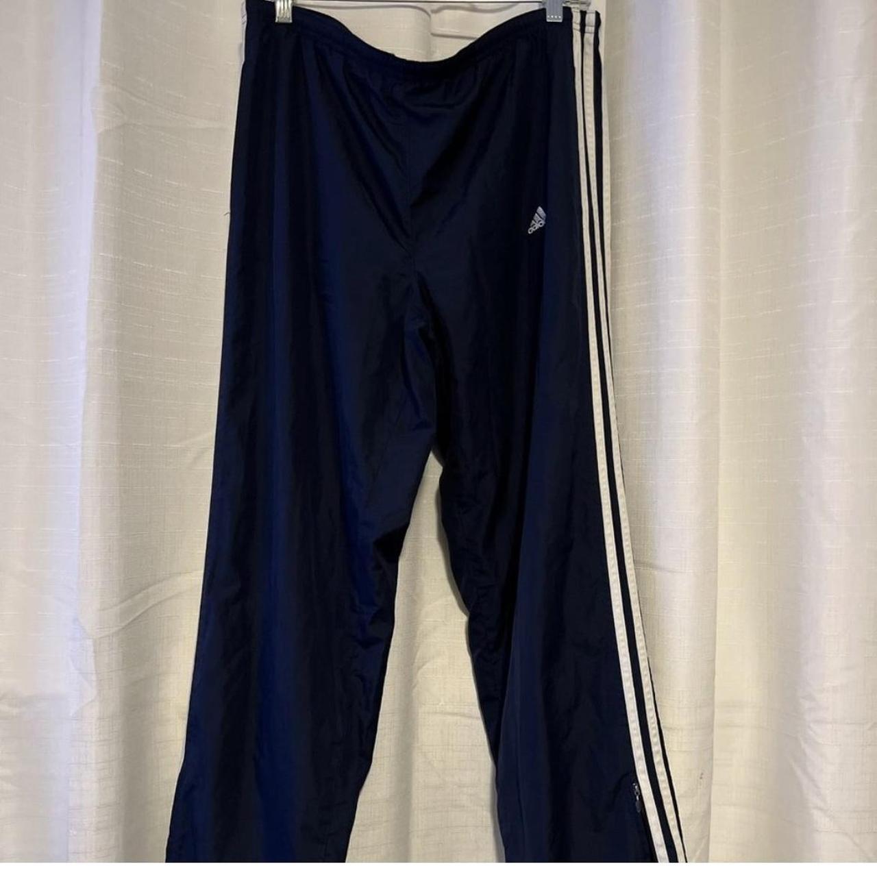 adidas wind pants in good condition, bought from - Depop