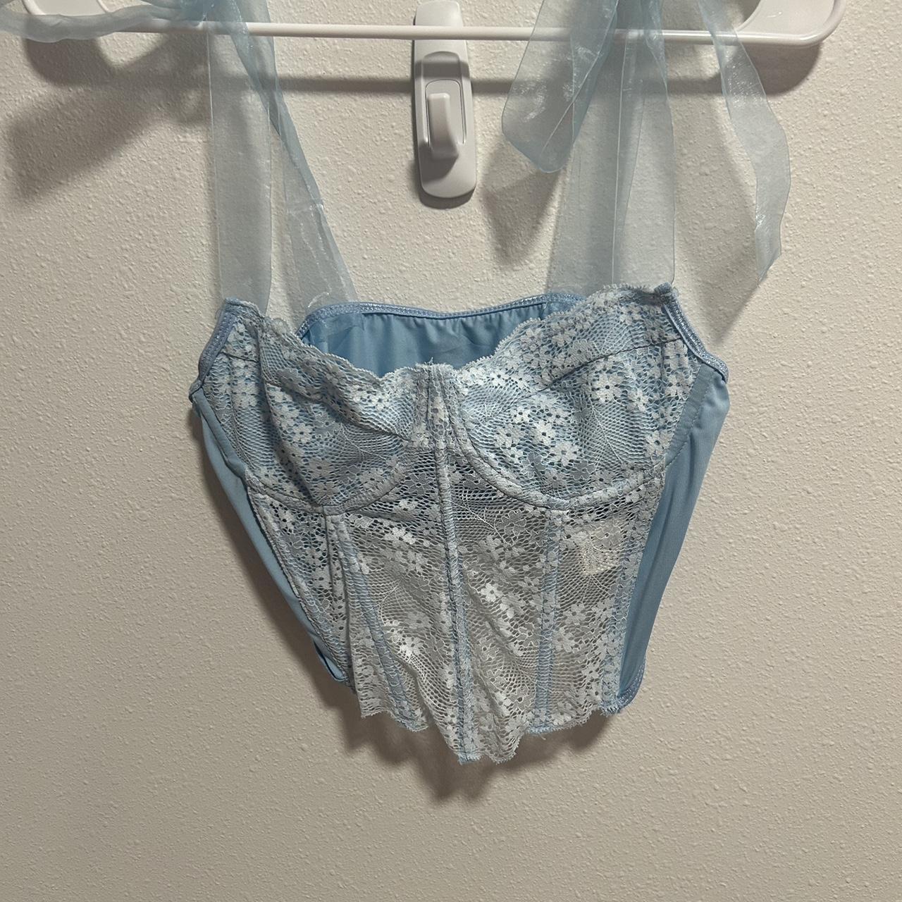 Light blue lace corset top with ribbon ties. Very... Depop