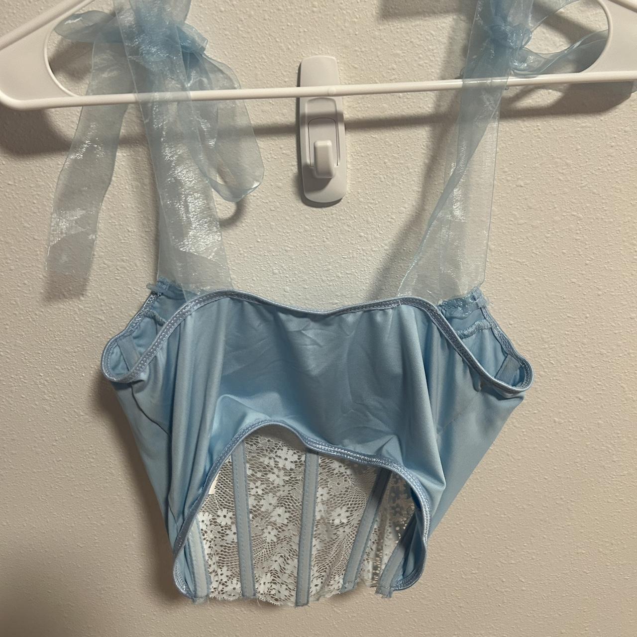 Light blue lace corset top with ribbon ties. Very... Depop