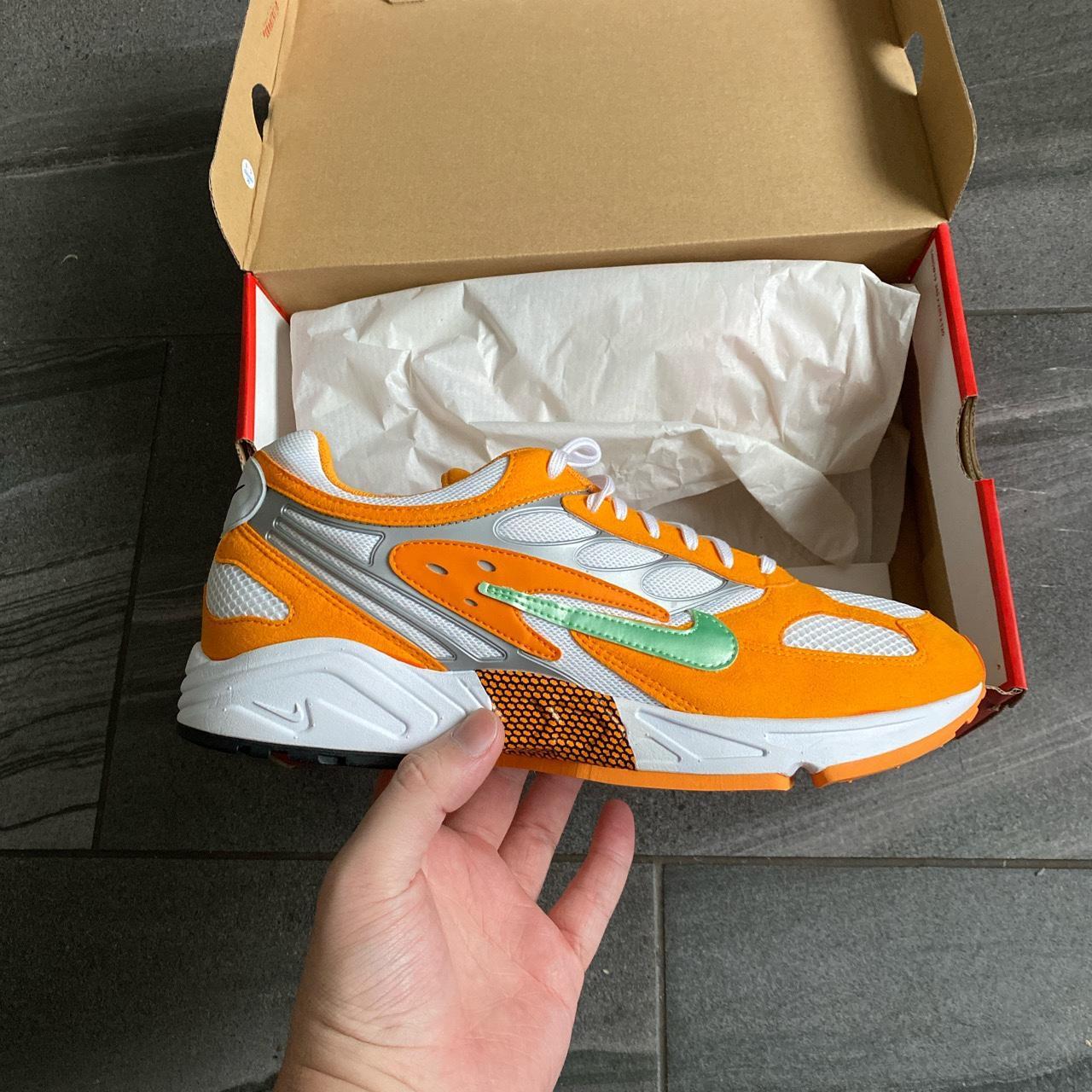 Nike air hotsell ghost racer orange