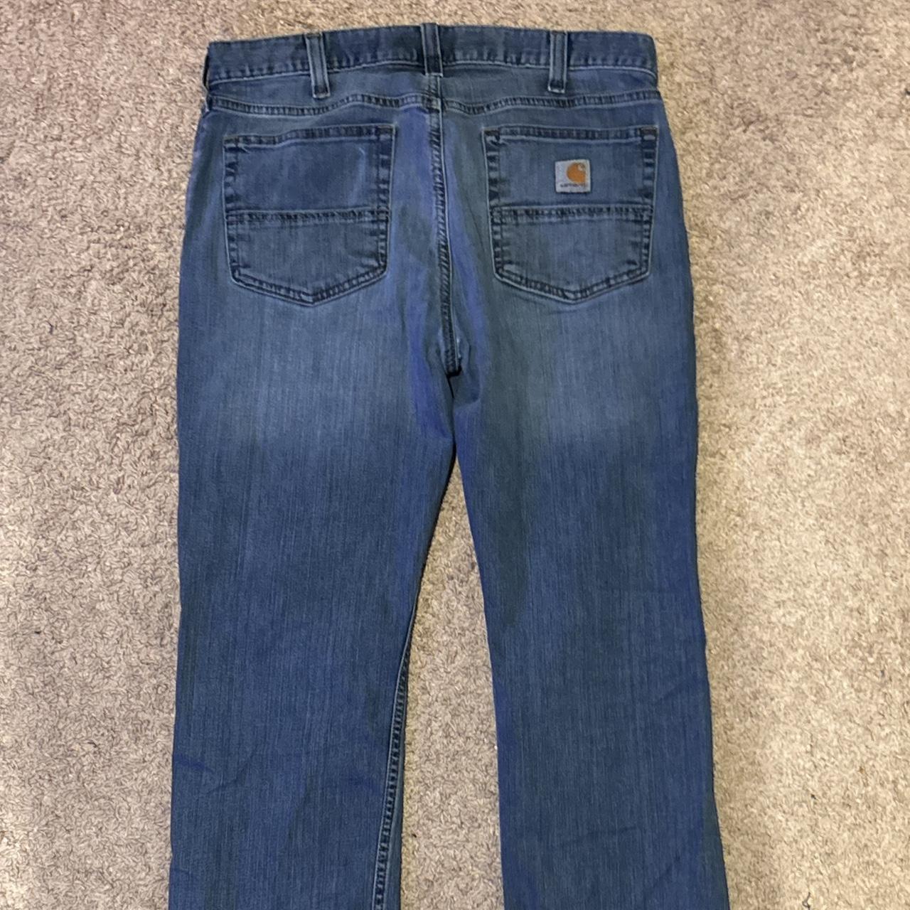 Carhartt relaxed fit jeans 33 Small rips on the... - Depop