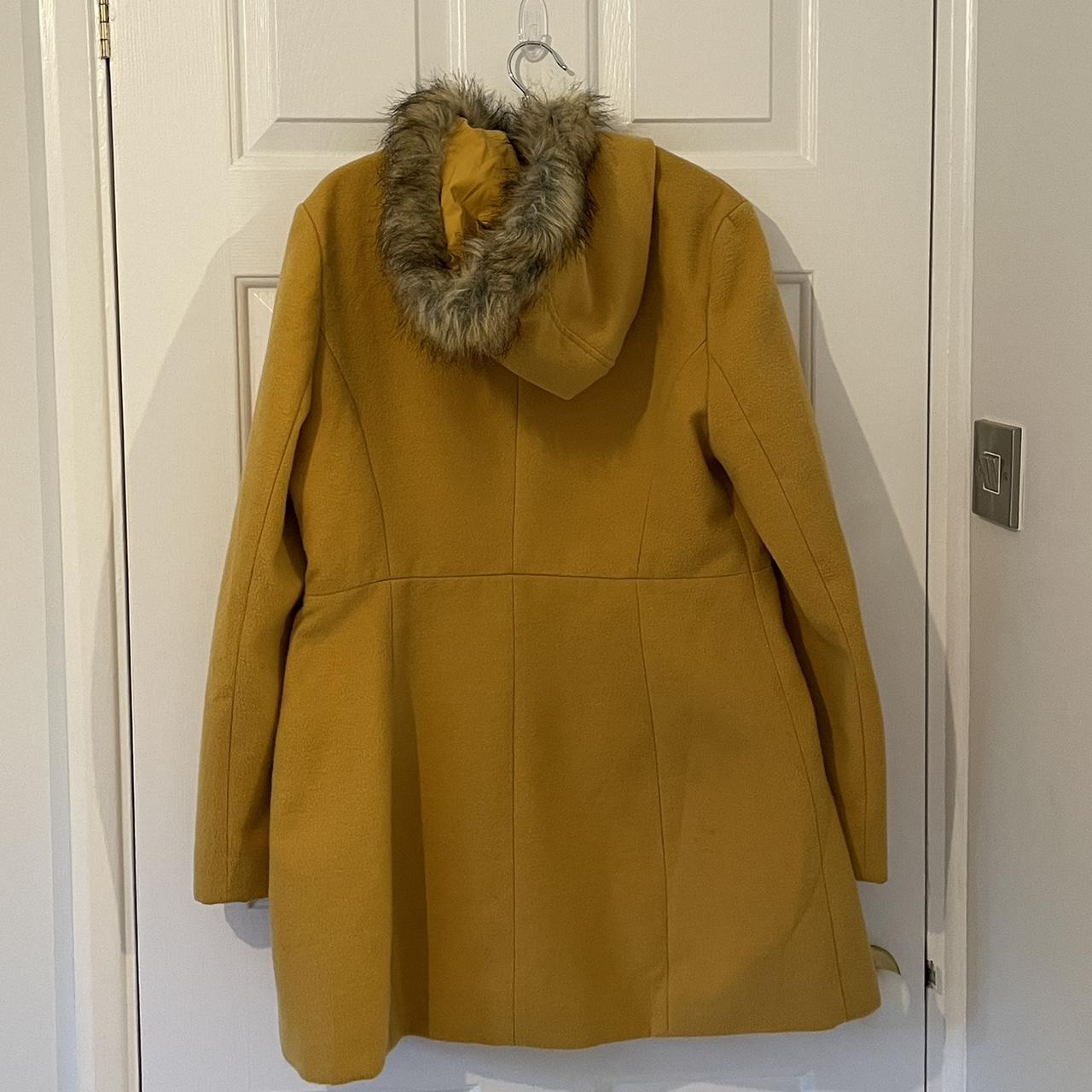 Mustard duffle coat with faux fur trim and pom-poms. | Depop