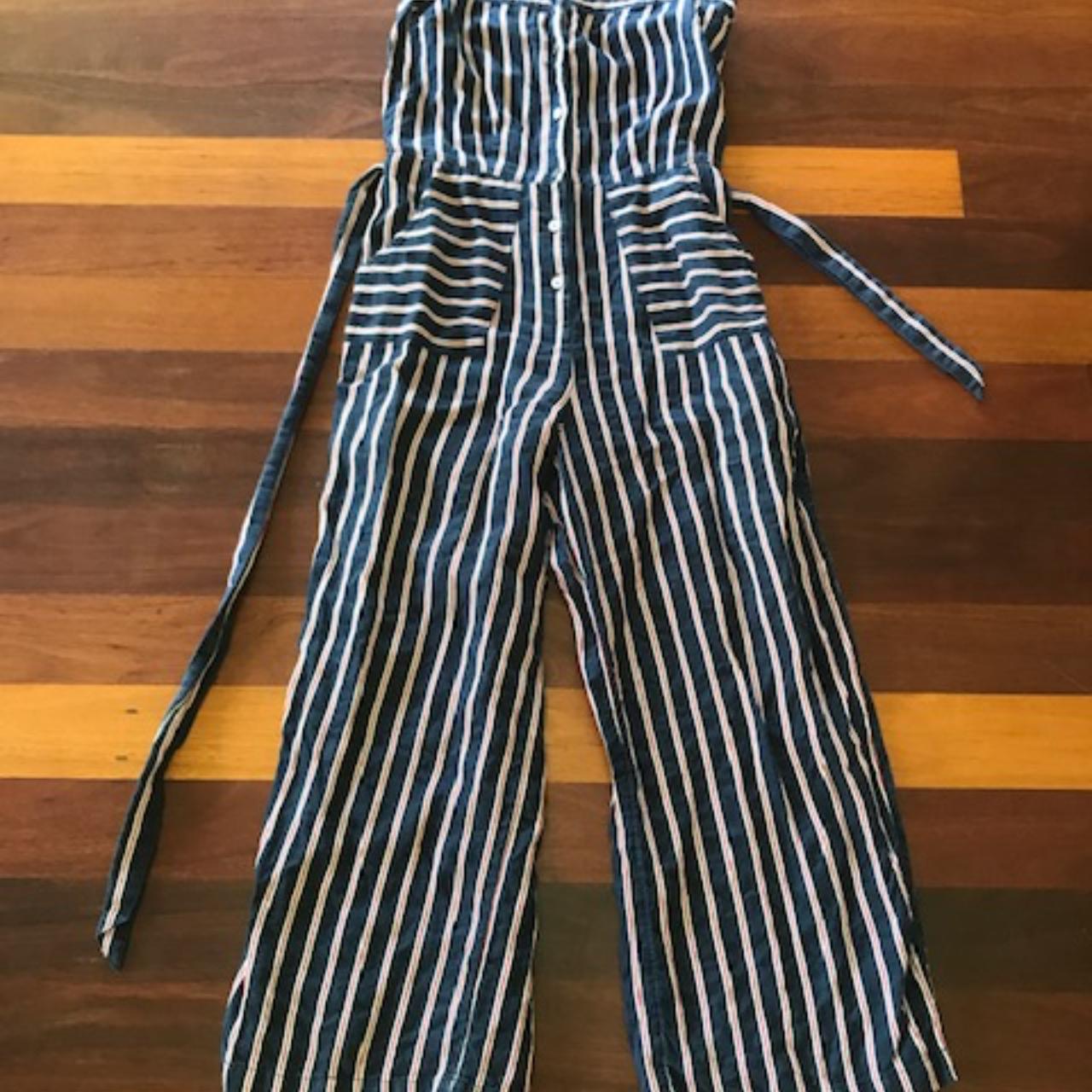 Jumpsuit with blue, red white stripes. The label is... - Depop