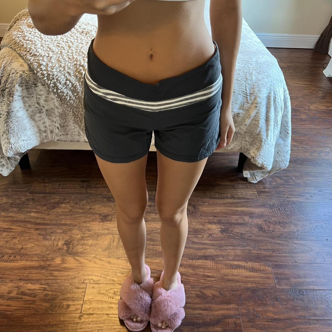 Grey lululemon shorts with zipper in back and built | Depop