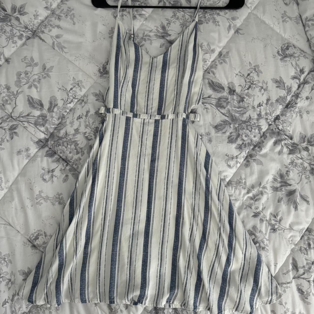 Blue and white striped dress with side cut. Depop