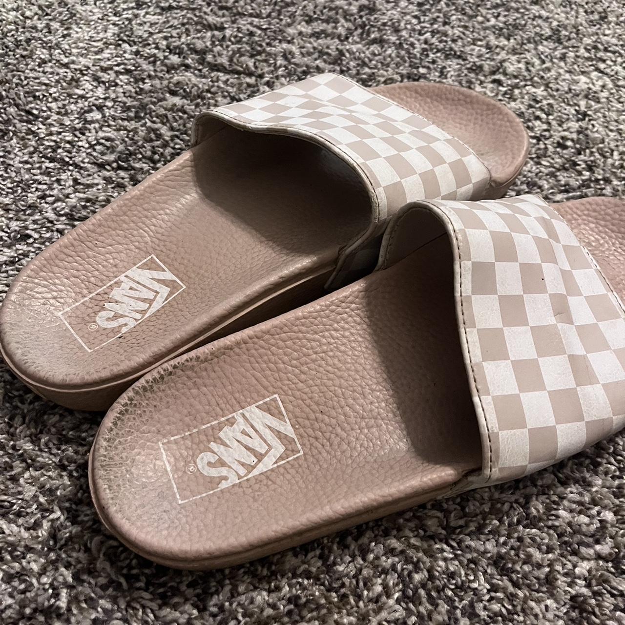 Vans pink and white checkered slides. Have a little