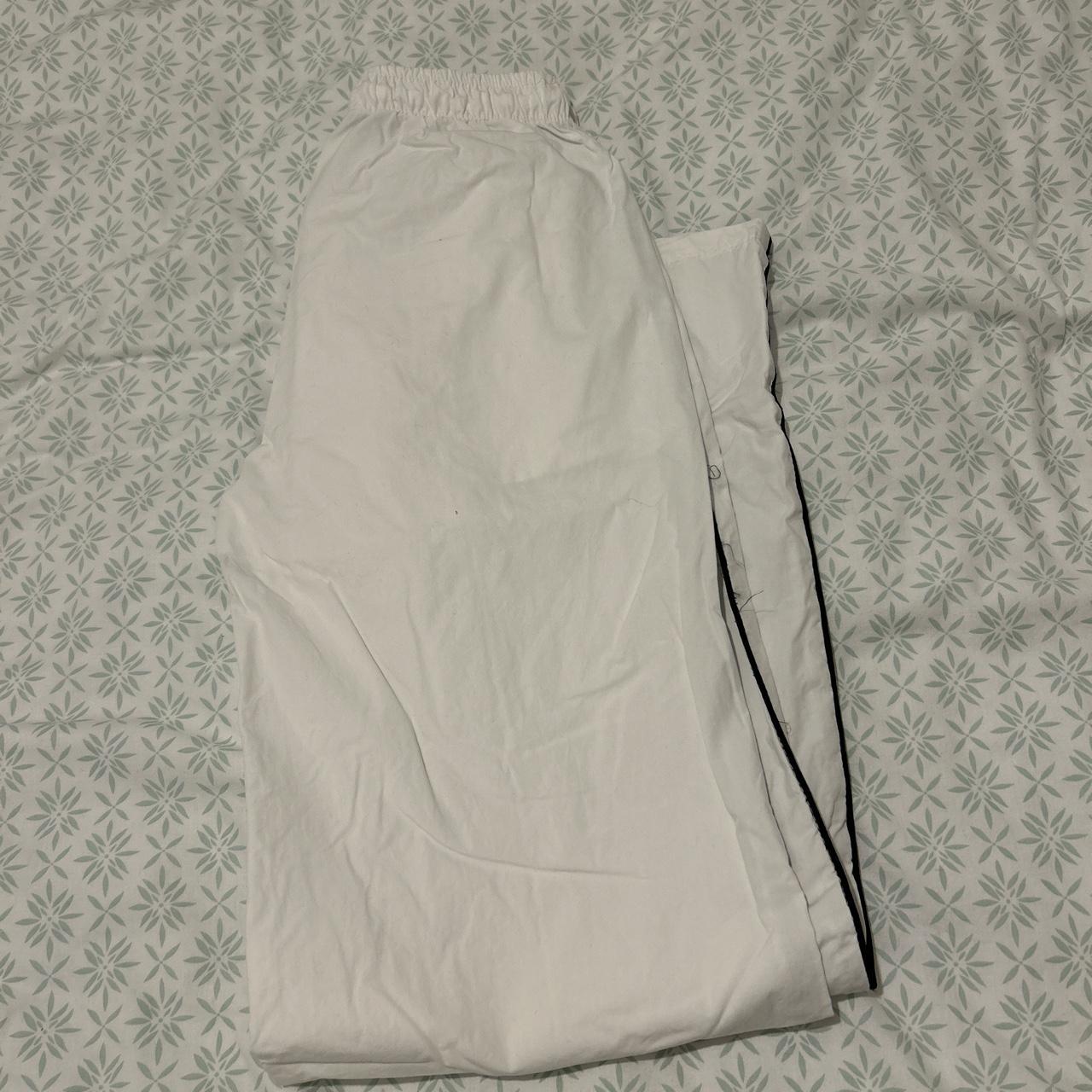 Subdued white track pants. Been worn once in... - Depop