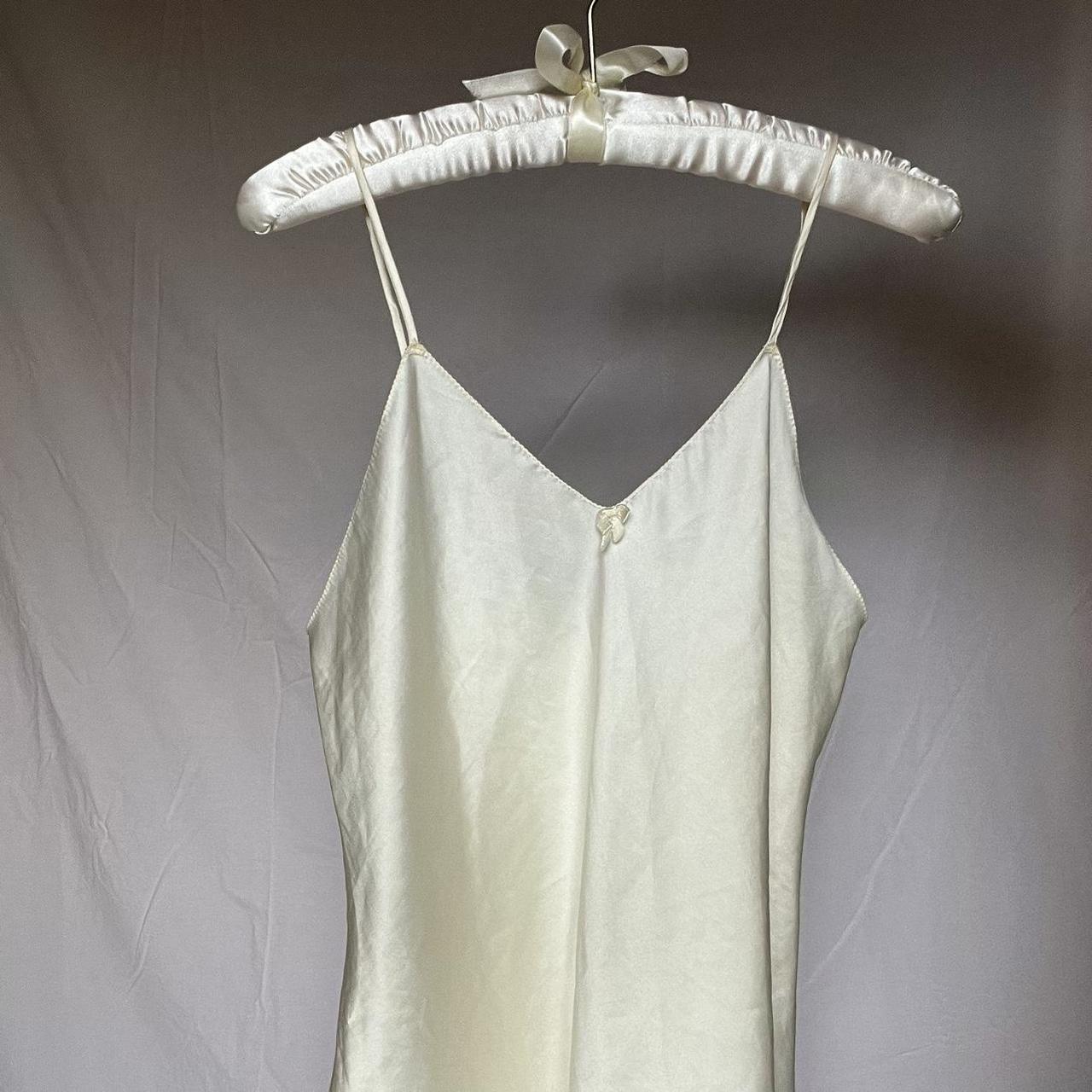 medium length white slip dress with bow... Depop