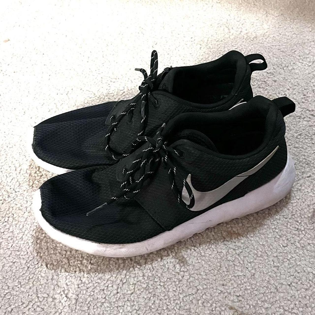 half black and white nike shoes
