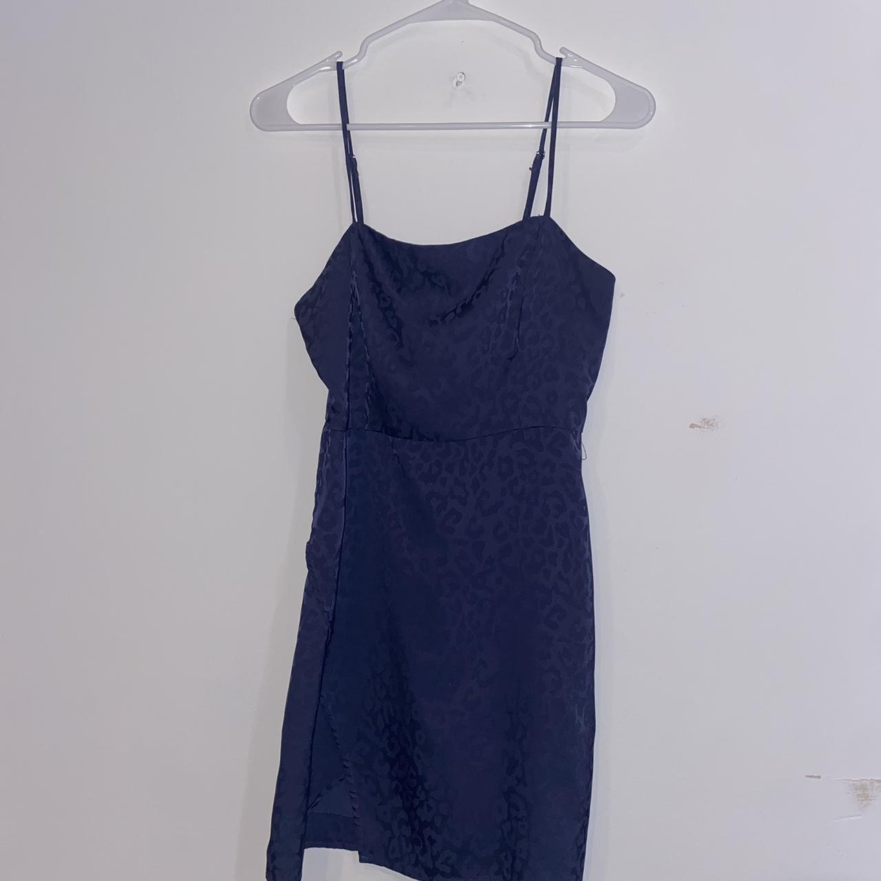 Dark blue cheetah print mini dress, small slit. Worn... - Depop