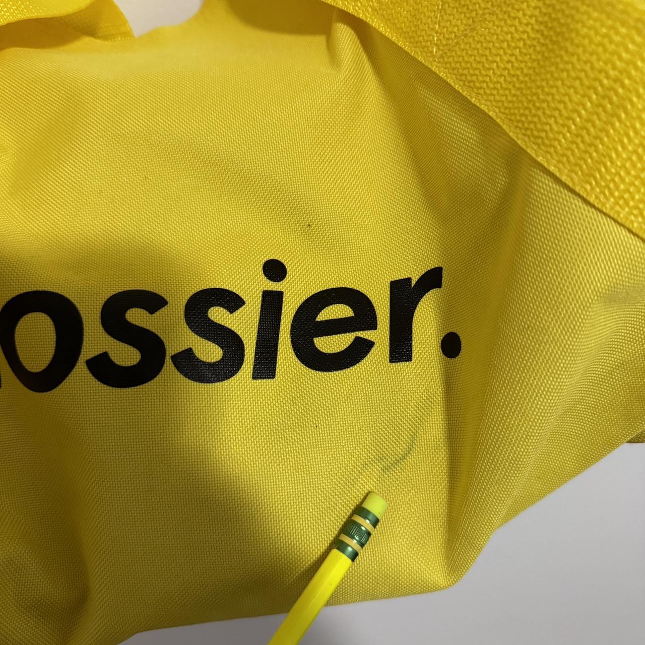 Glossier yellow duffel online bag