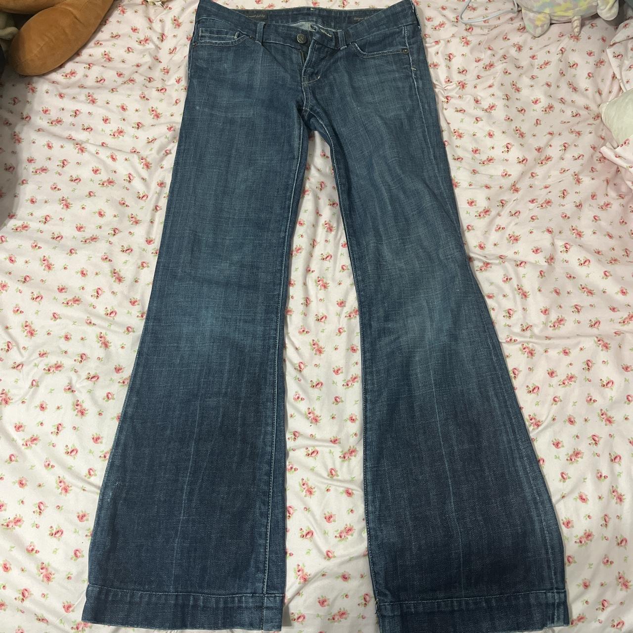 cute lowrise flare jeans, imperfections at the... - Depop