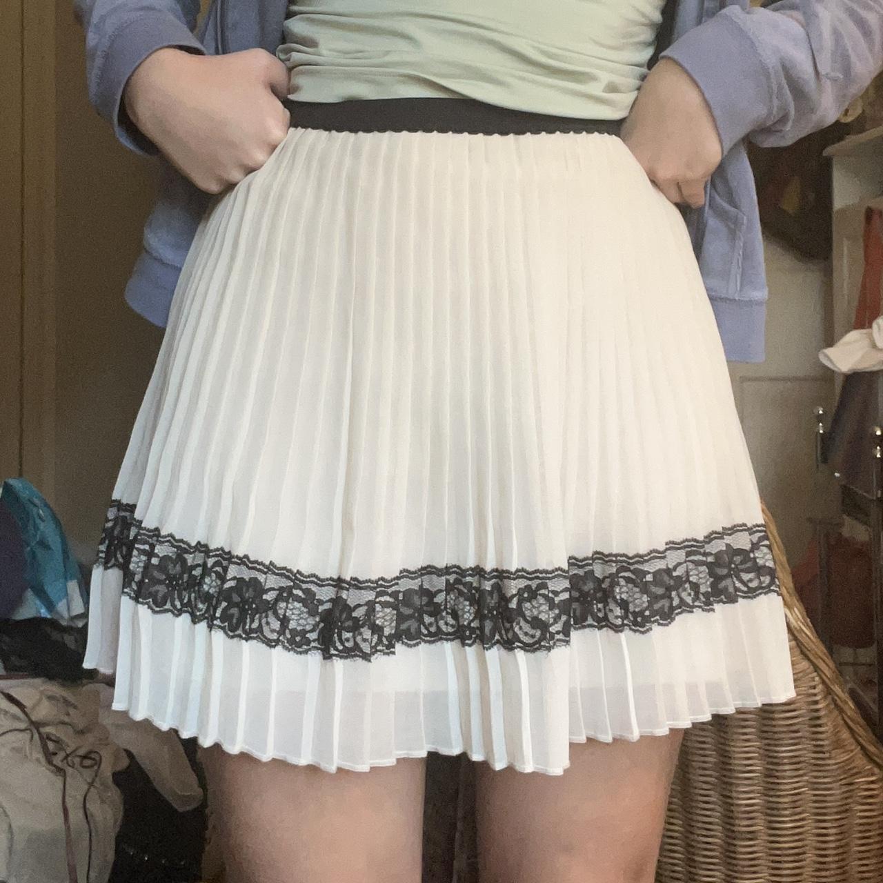 pleated cream lace skirt details size small, fits... Depop