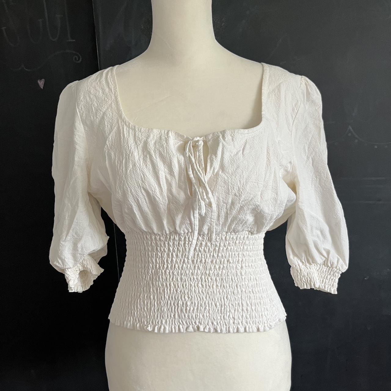 White puff sleeve top. Slightly cropped. Zip closure... - Depop