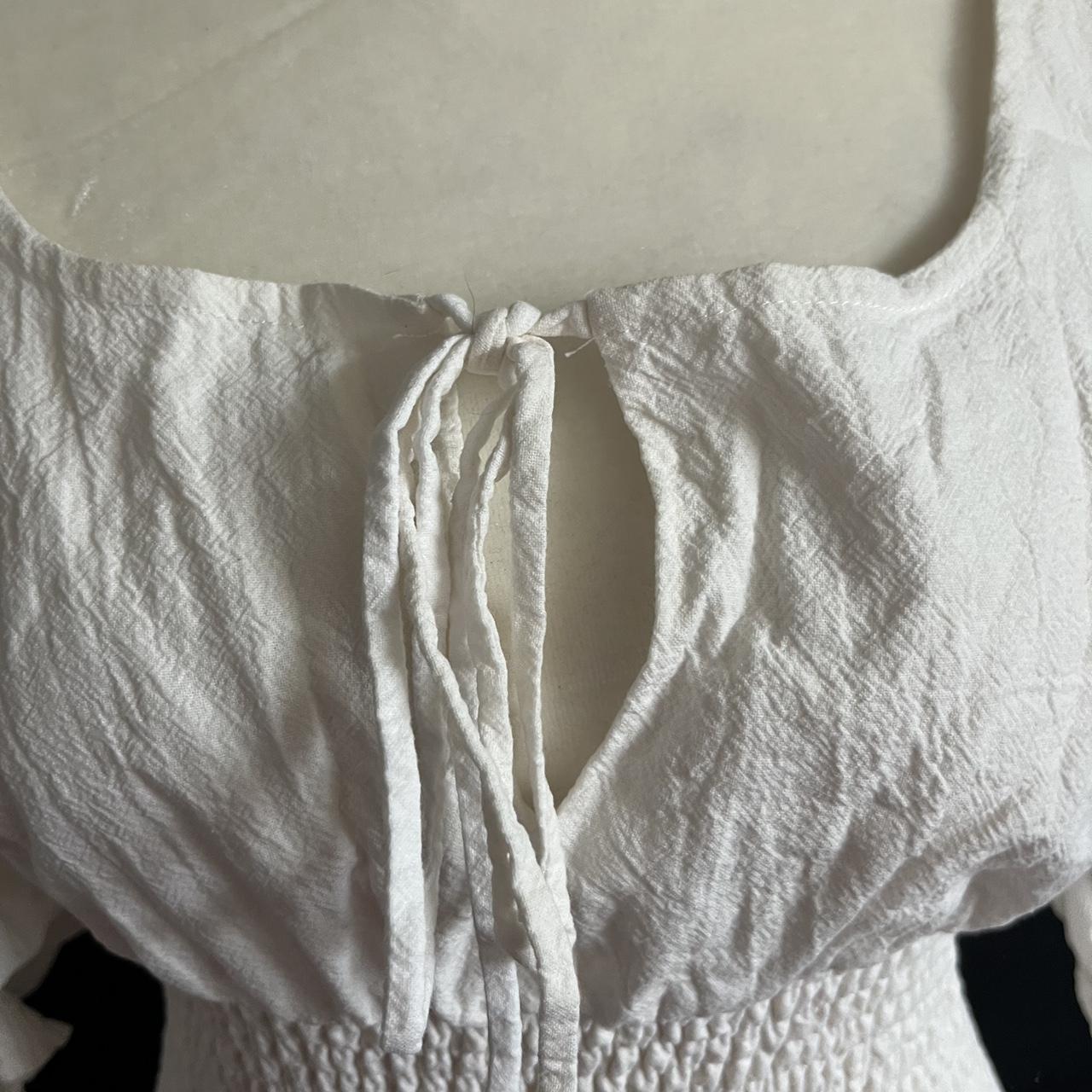 White puff sleeve top. Slightly cropped. Zip closure... - Depop